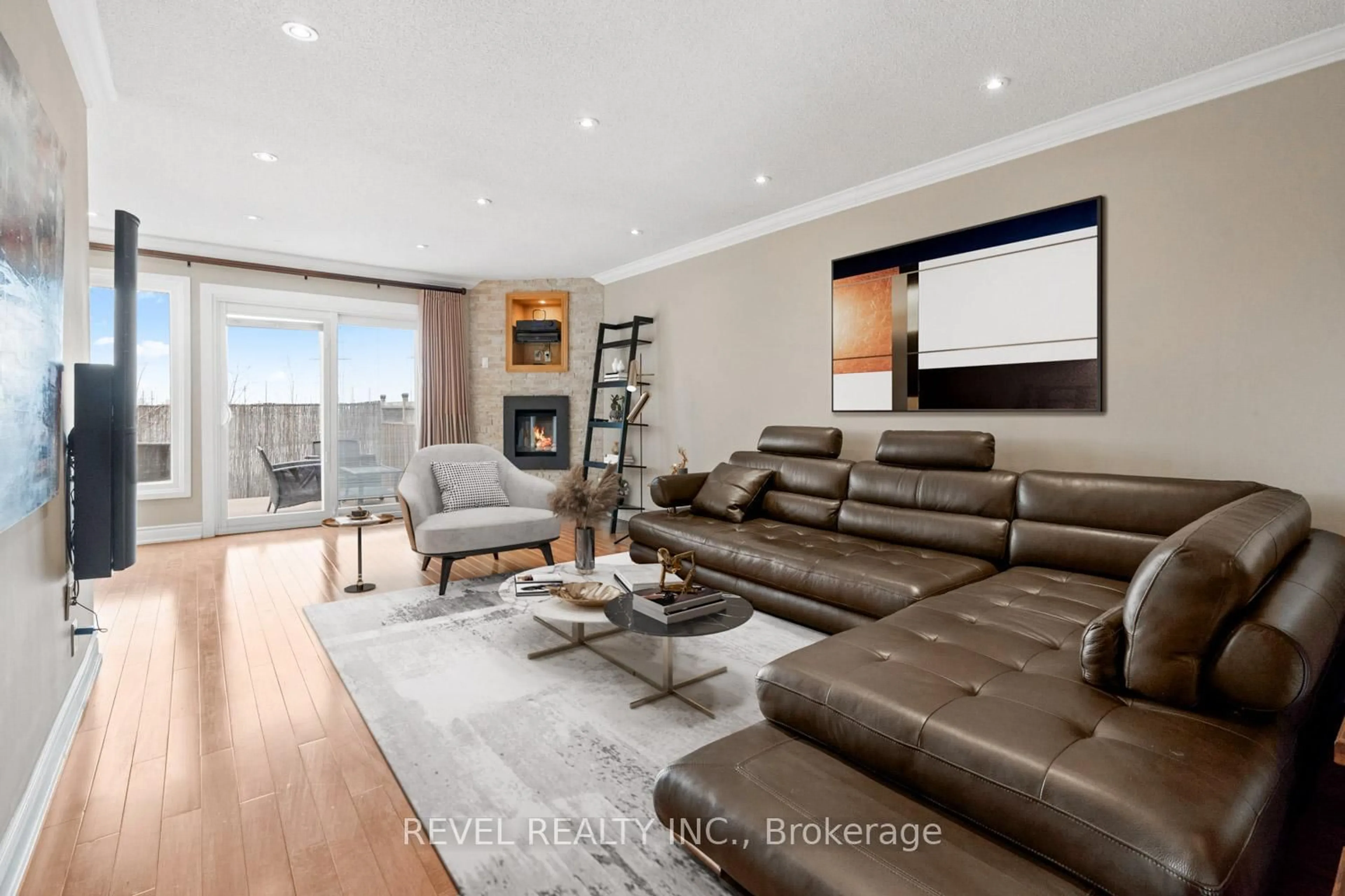 Living room with furniture, wood/laminate floor for 35 Bigham Cres, Toronto Ontario M9C 5C5