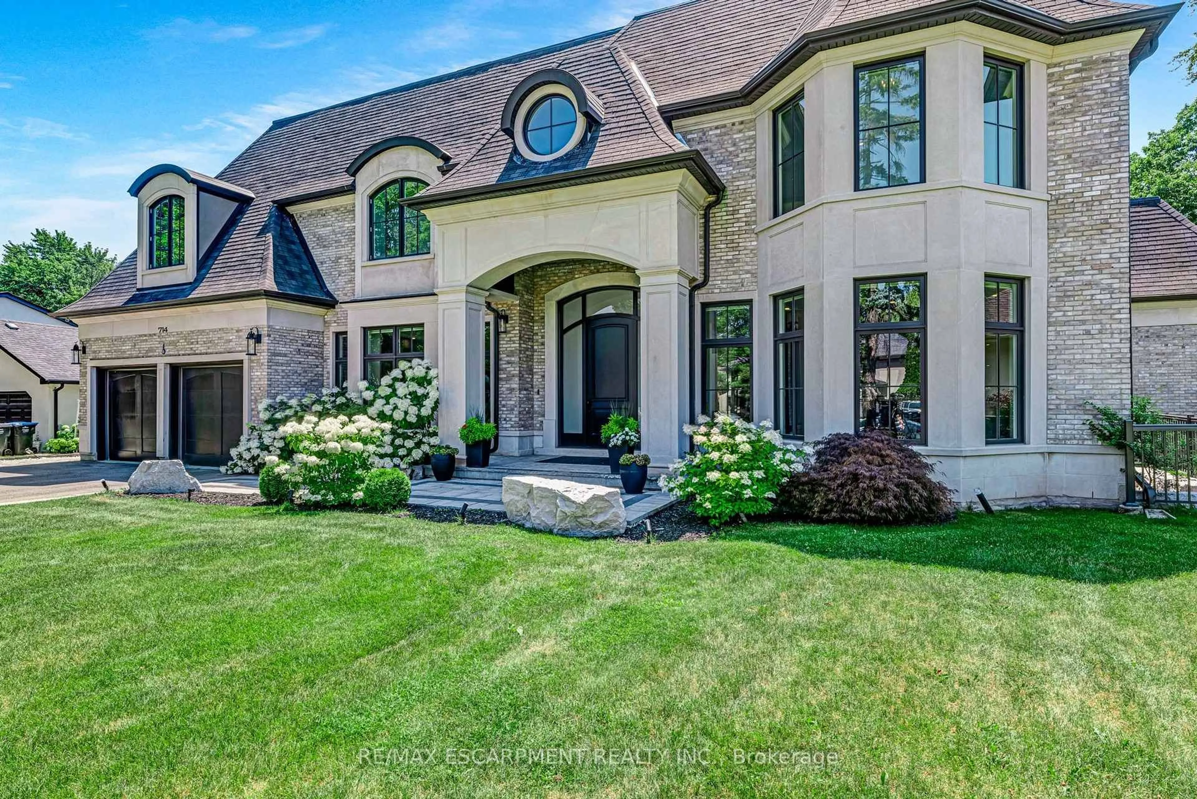 Home with brick exterior material, street for 714 Atoka Dr, Mississauga Ontario L5H 1Y6