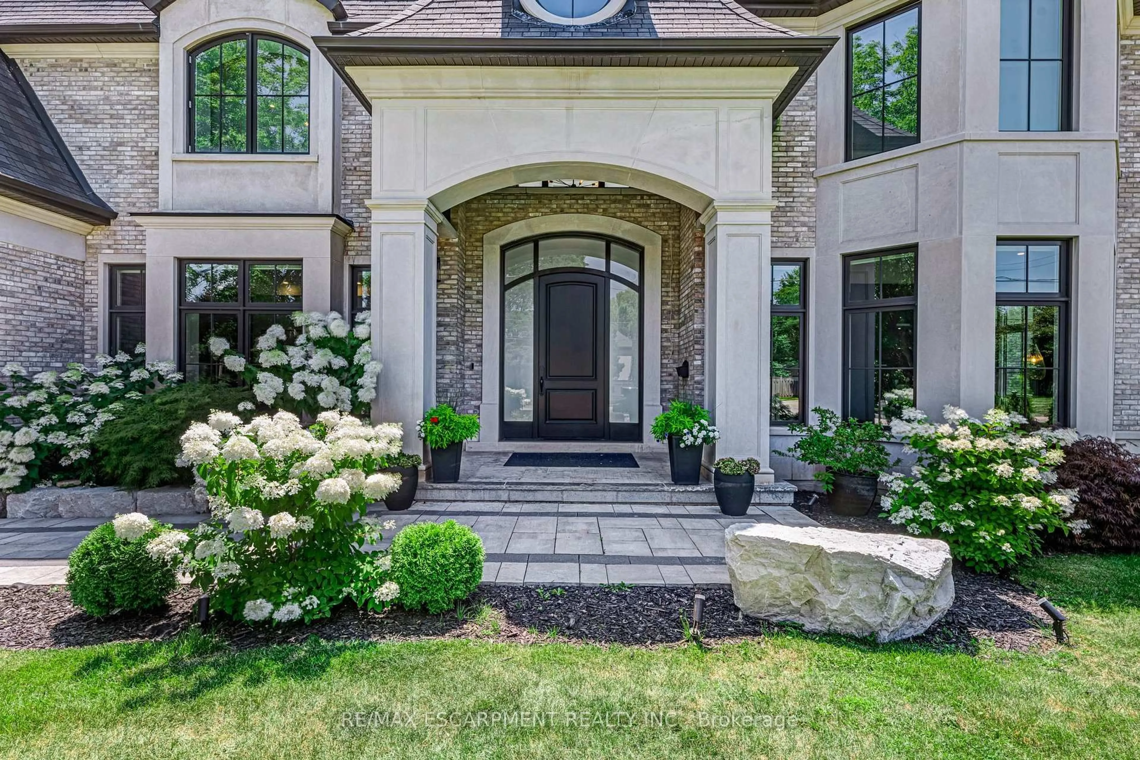 Home with brick exterior material, street for 714 Atoka Dr, Mississauga Ontario L5H 1Y6