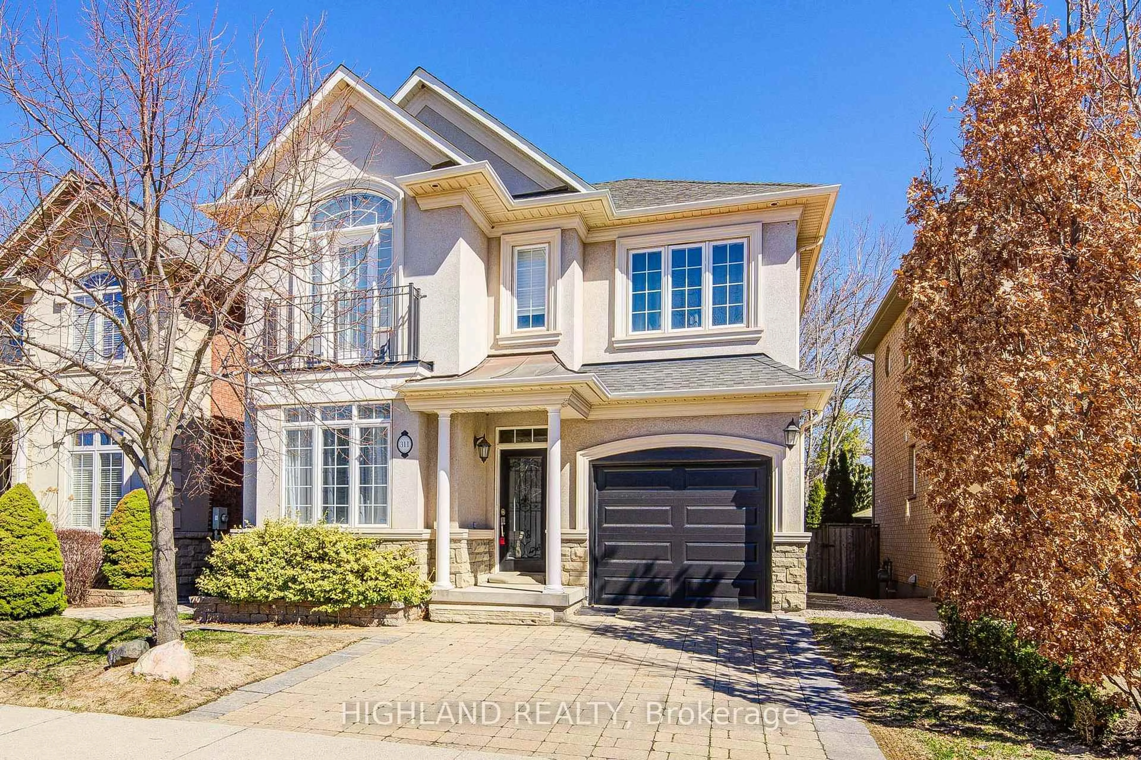Home with brick exterior material, street for 311 Duskywing Way, Oakville Ontario L6L 6X6