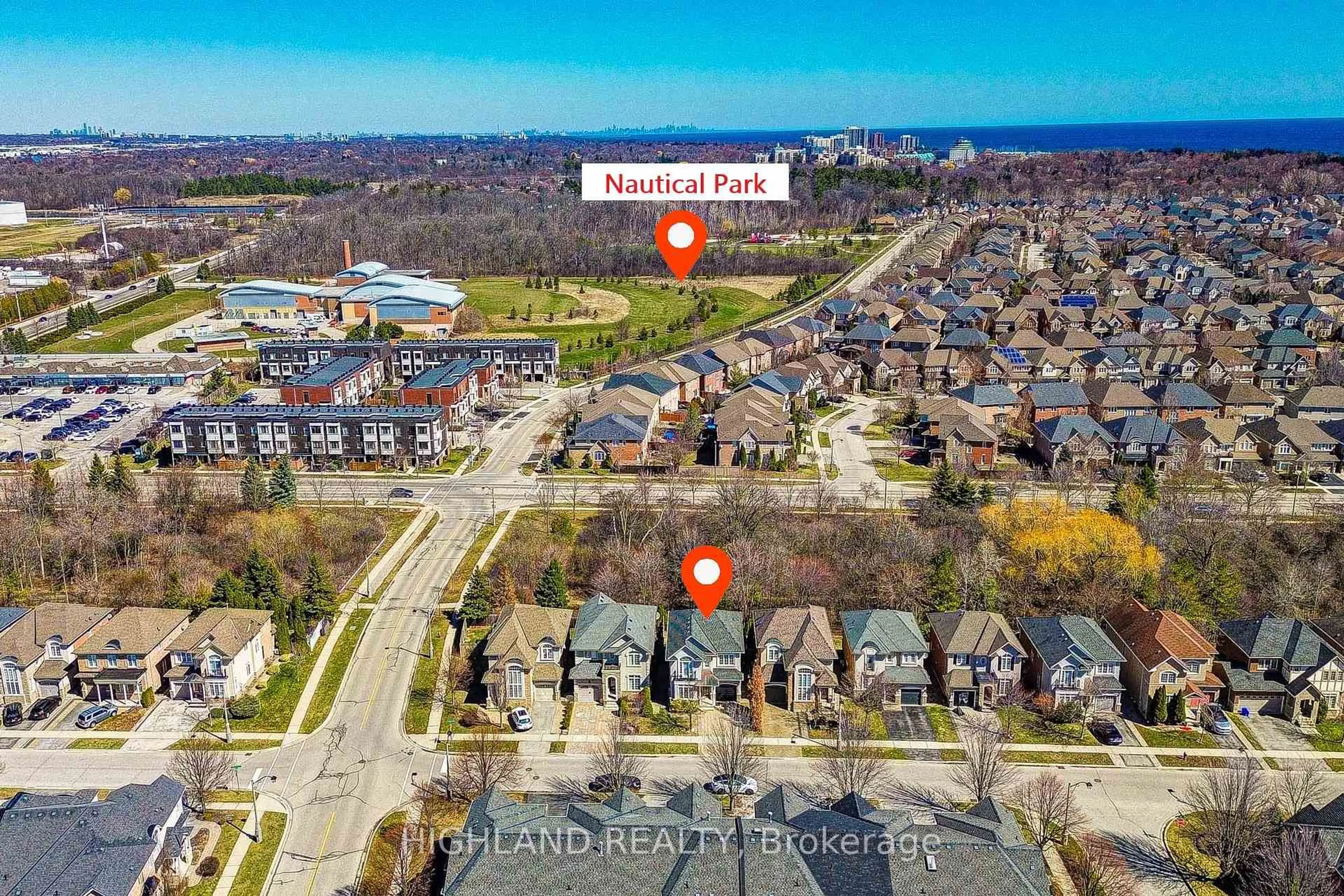 A pic from outside/outdoor area/front of a property/back of a property/a pic from drone, street for 311 Duskywing Way, Oakville Ontario L6L 6X6