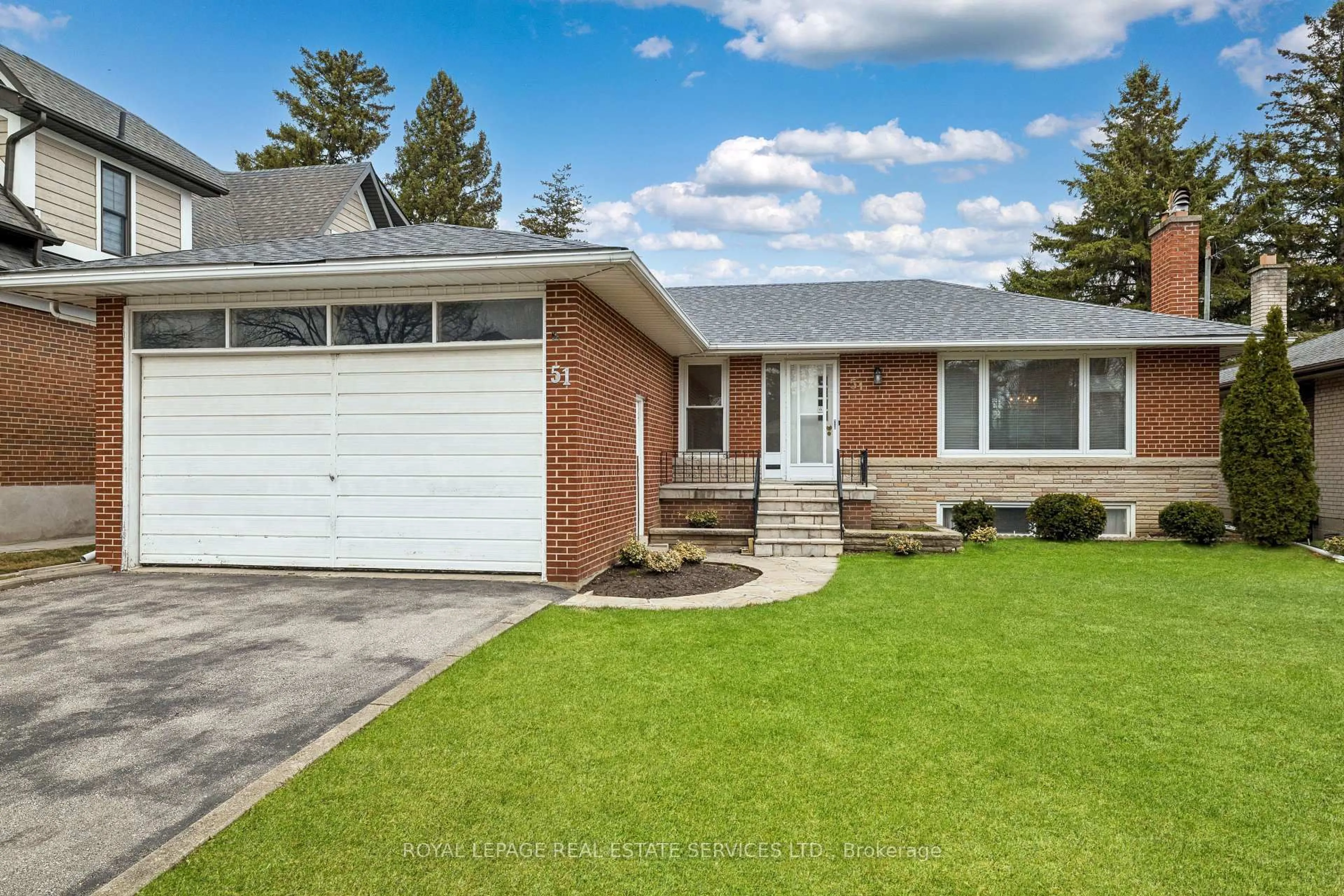 Home with brick exterior material, street for 51 Smithwood Dr, Toronto Ontario M9B 4S1