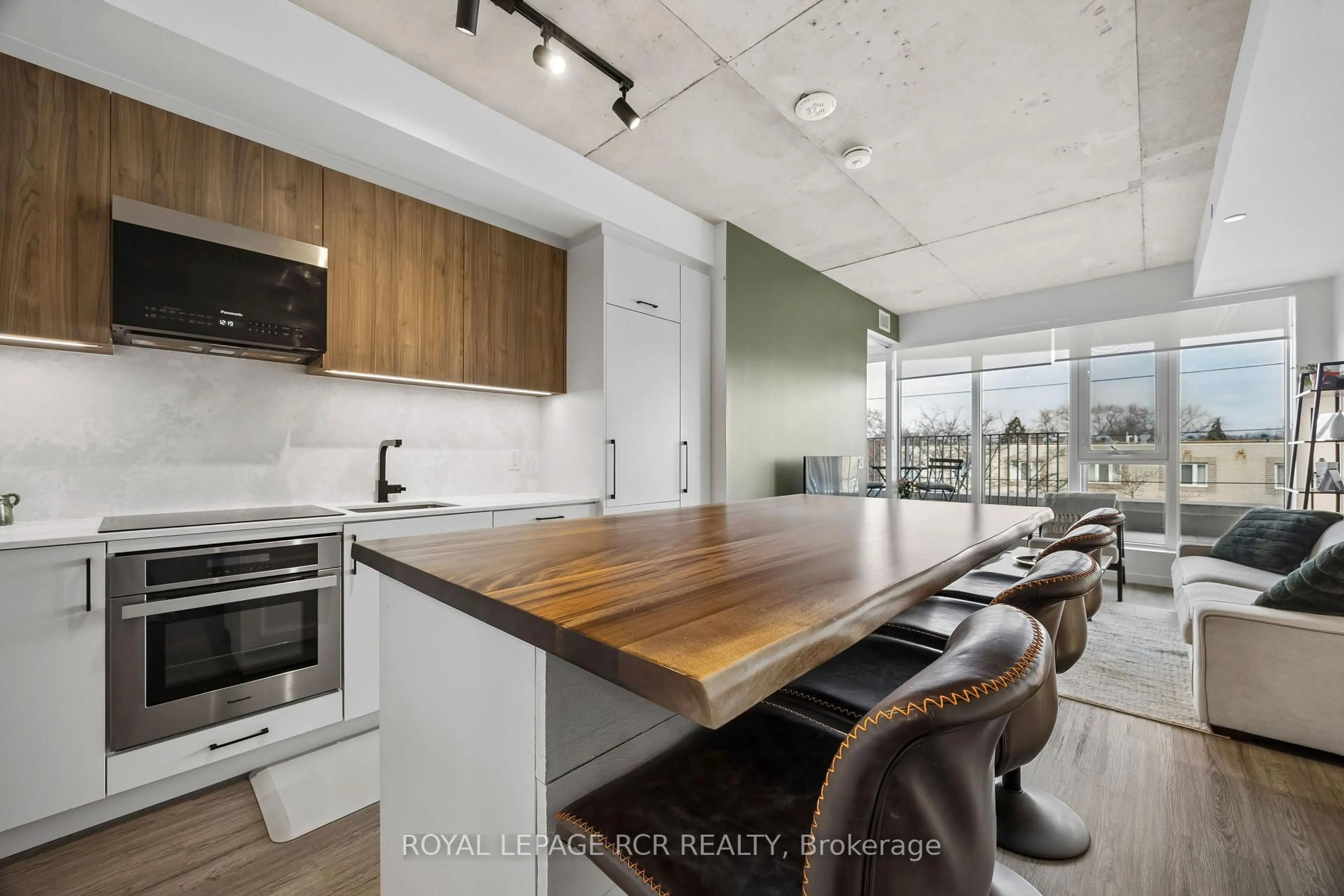 Open concept kitchen, wood/laminate floor for 689 The Queensway #321, Toronto Ontario M8Y 0C8
