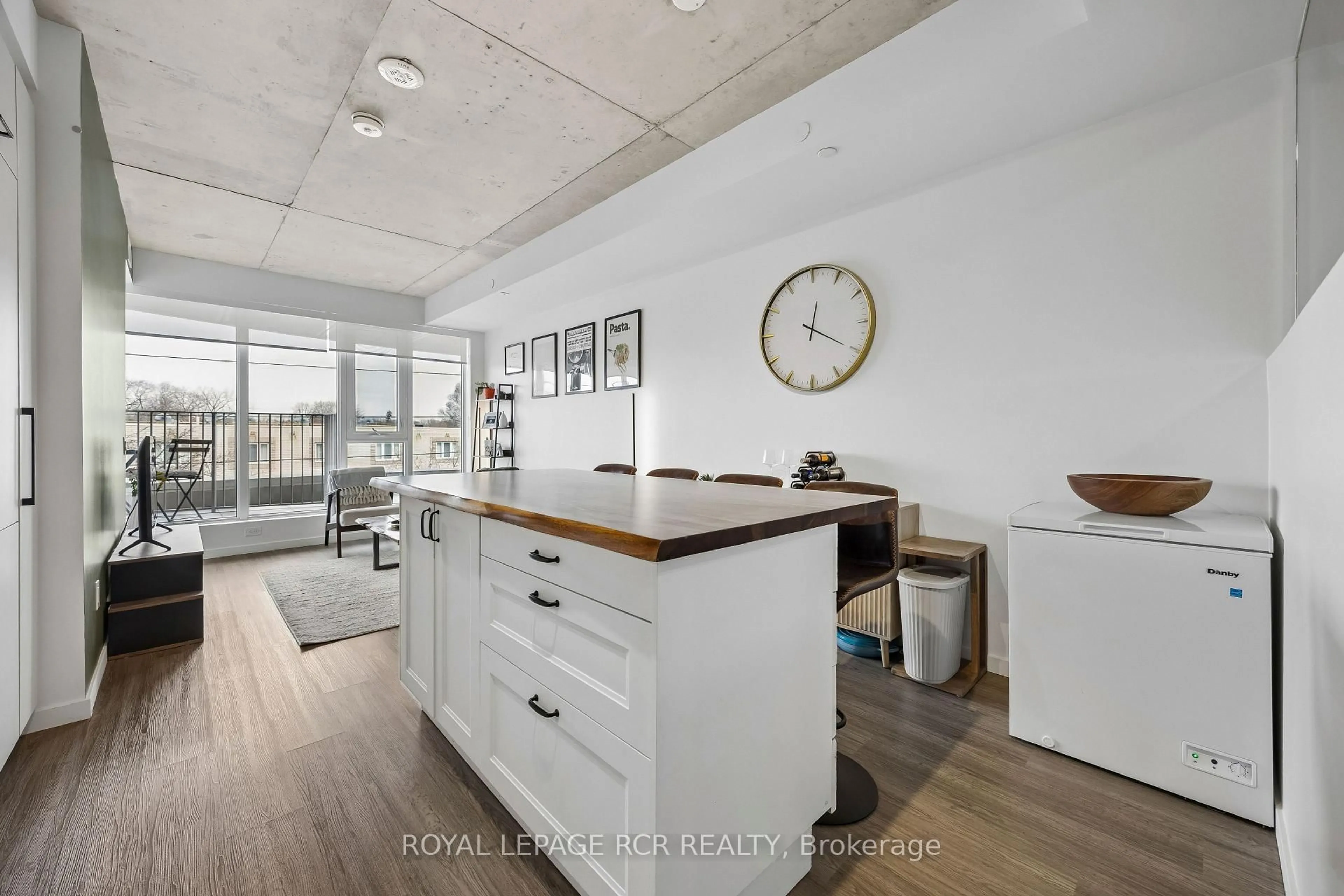 Open concept kitchen, wood/laminate floor for 689 The Queensway #321, Toronto Ontario M8Y 0C8