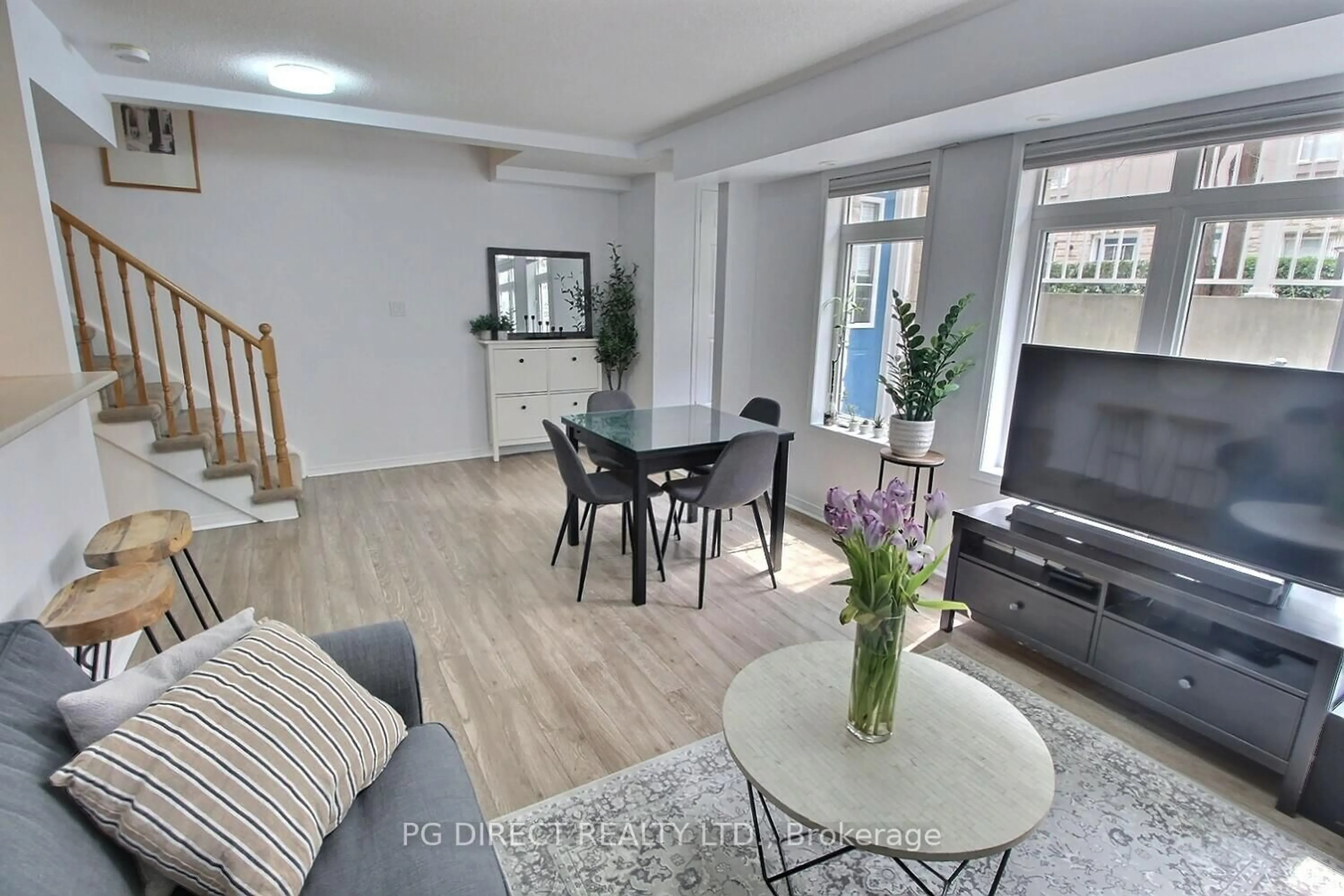 Living room with furniture, unknown for 50 Turntable Cres #57, Toronto Ontario M6H 4K8