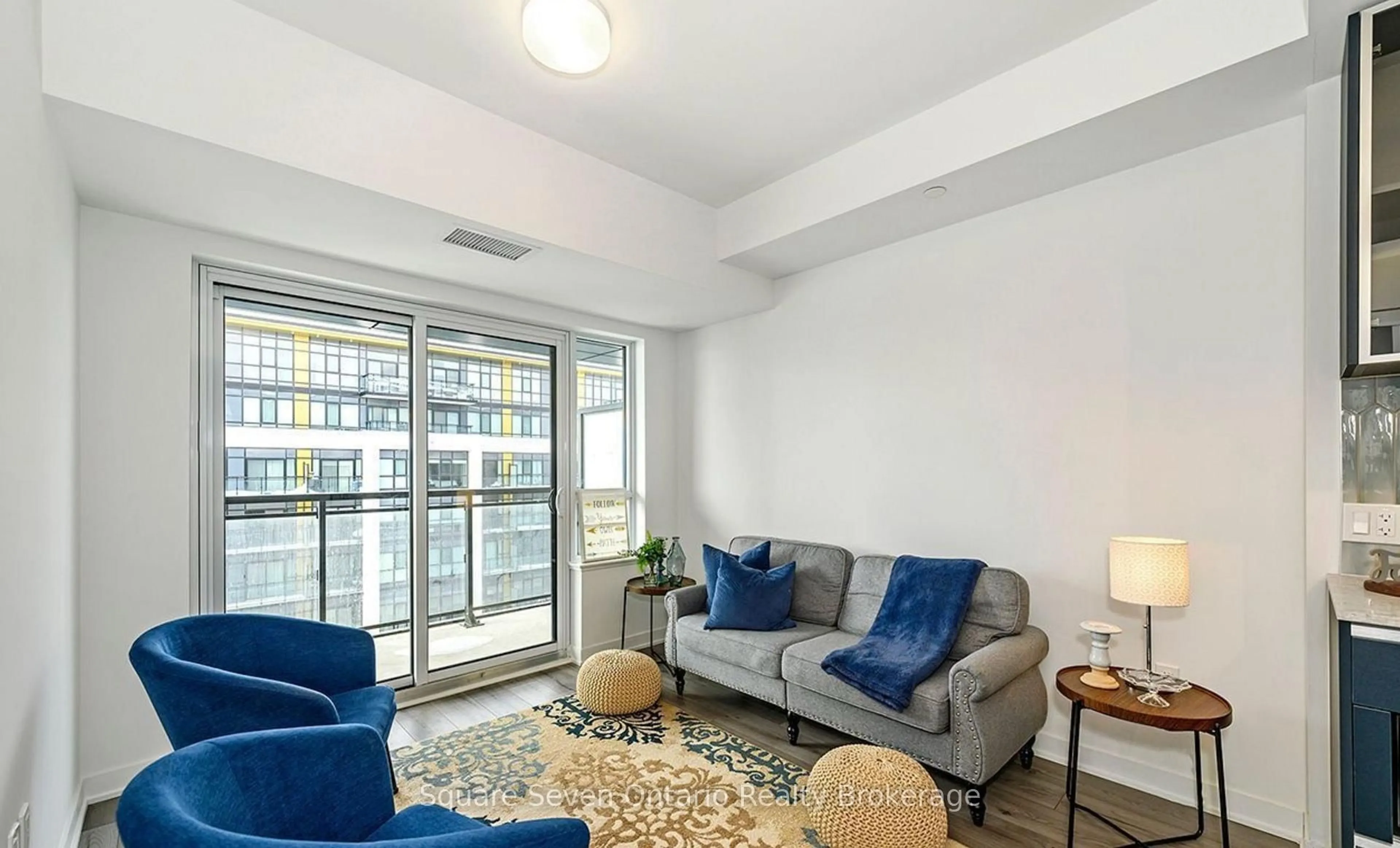 Living room with furniture, unknown for 395 Dundas St #820, Oakville Ontario L6M 4M2