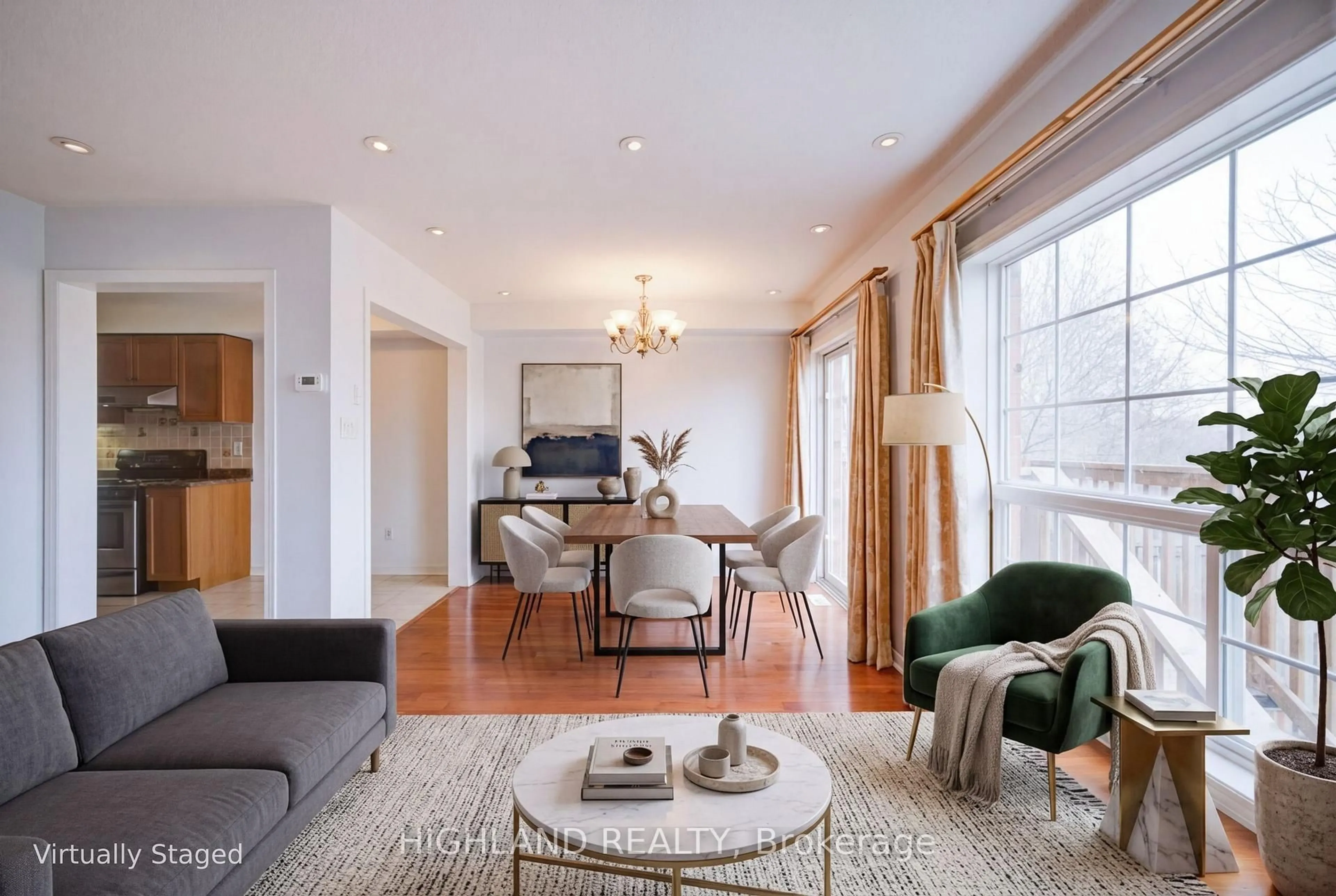 Living room with furniture, wood/laminate floor for 6399 Spinnaker Circ #99, Mississauga Ontario L5W 1Z5