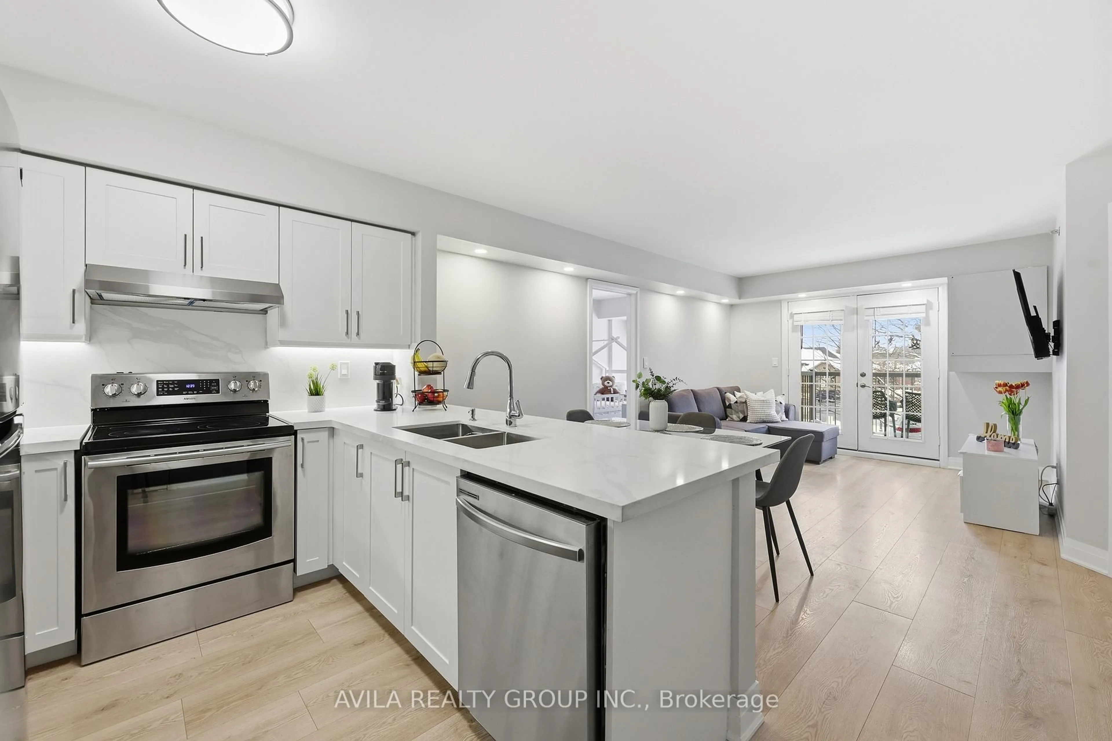 Open concept kitchen, ceramic/tile floor for 1460 Bishops Gate #203, Oakville Ontario L6M 4N5