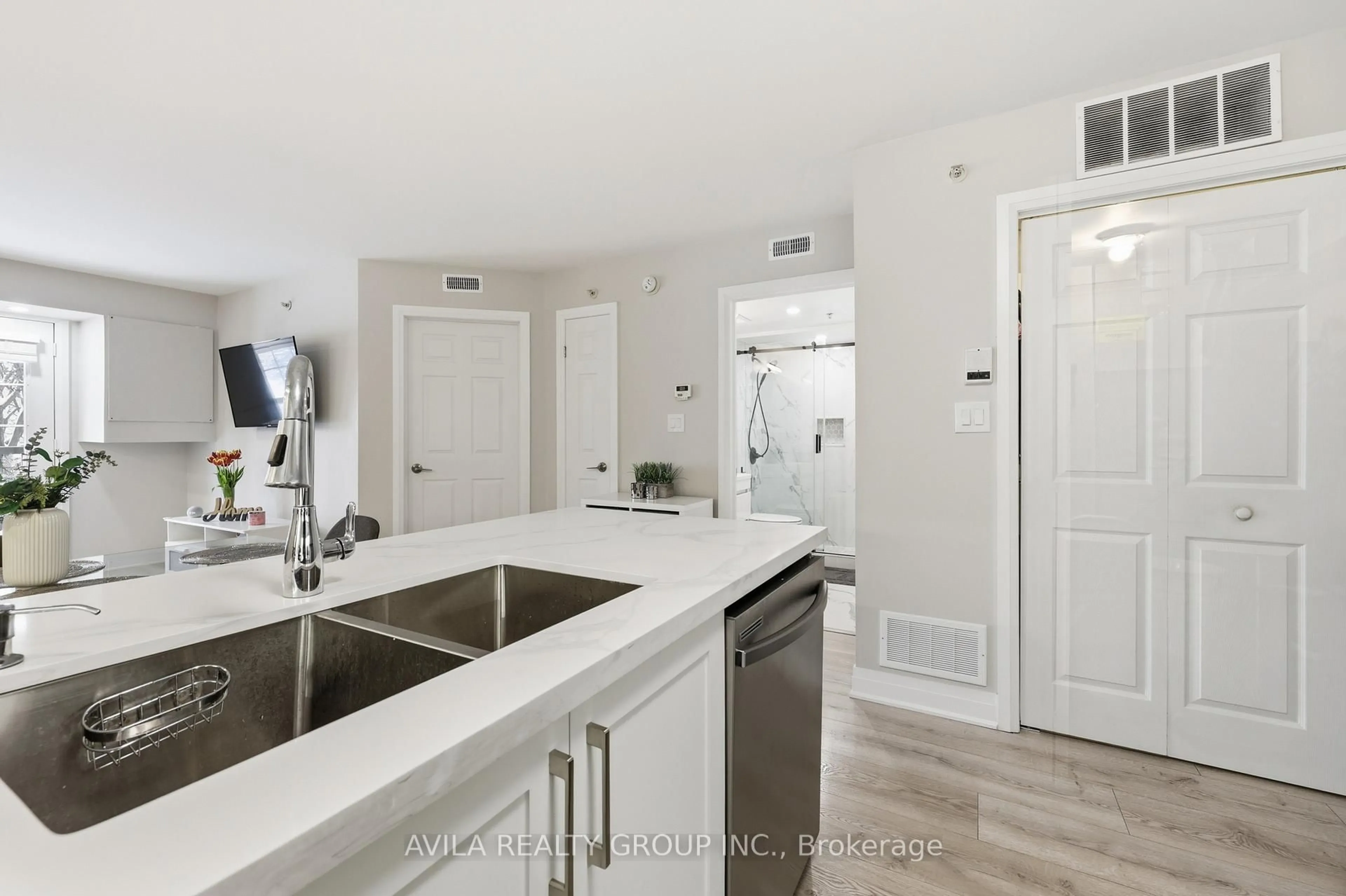 Open concept kitchen, unknown for 1460 Bishops Gate #203, Oakville Ontario L6M 4N5