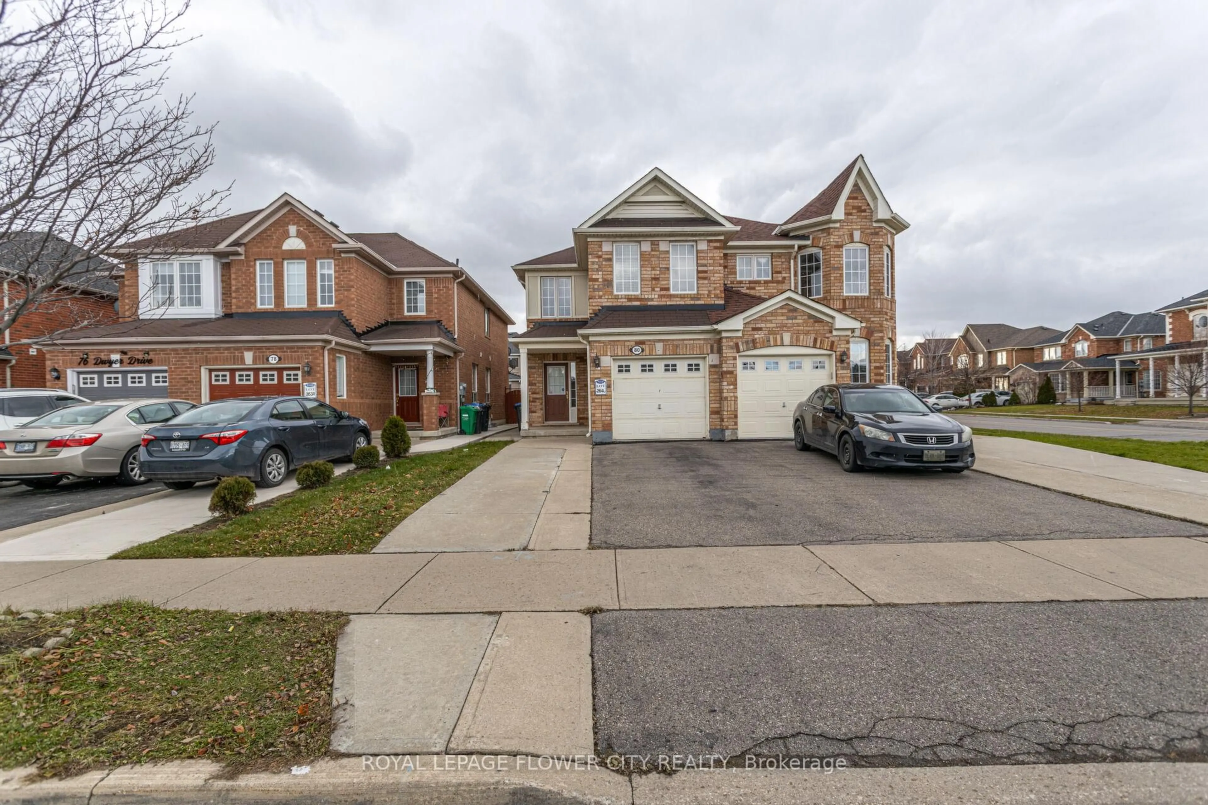 A pic from outside/outdoor area/front of a property/back of a property/a pic from drone, street for 80 Dwyer Dr, Brampton Ontario L6S 0B1