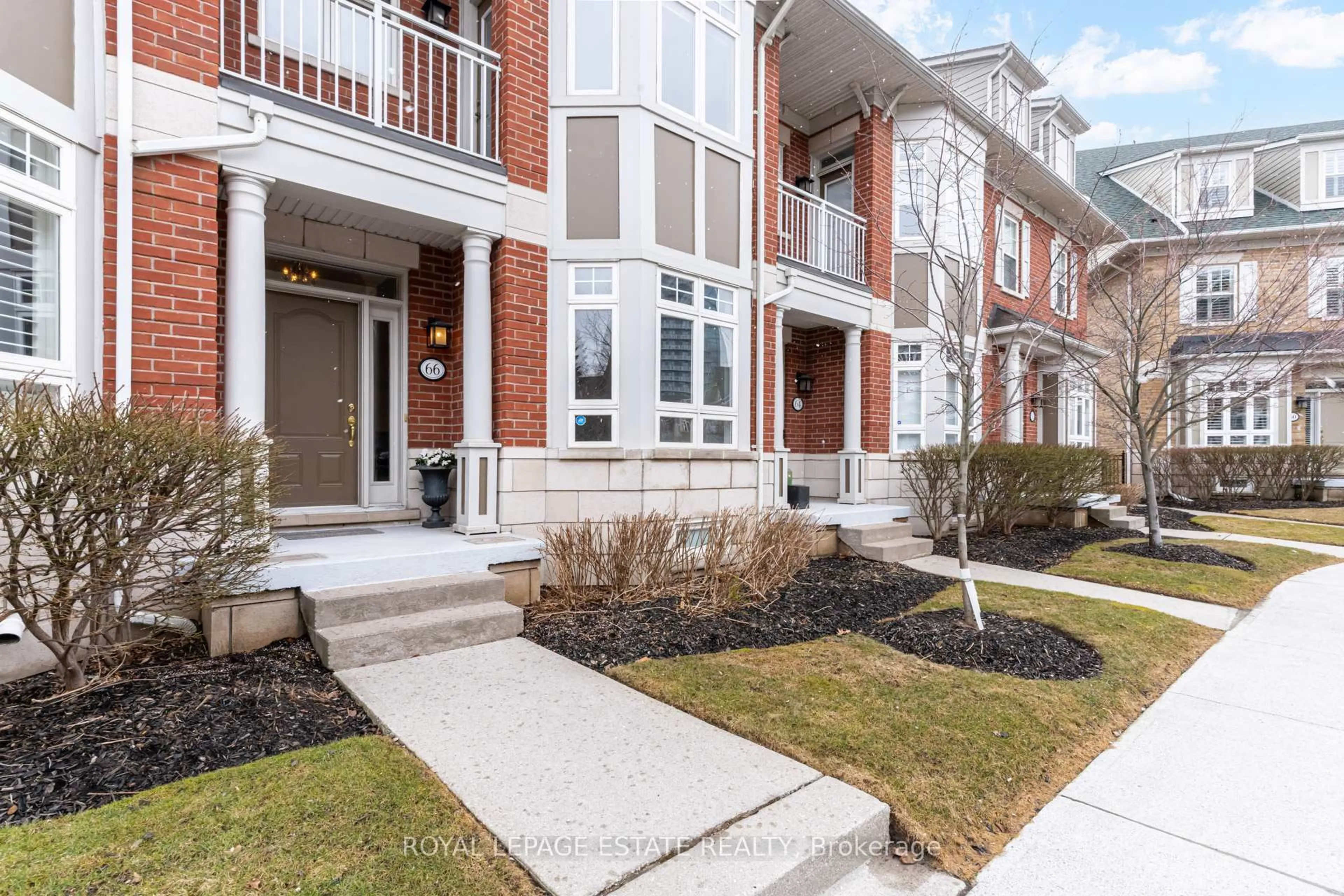 Home with brick exterior material, street for 66 Compass Way, Mississauga Ontario L5G 4T8