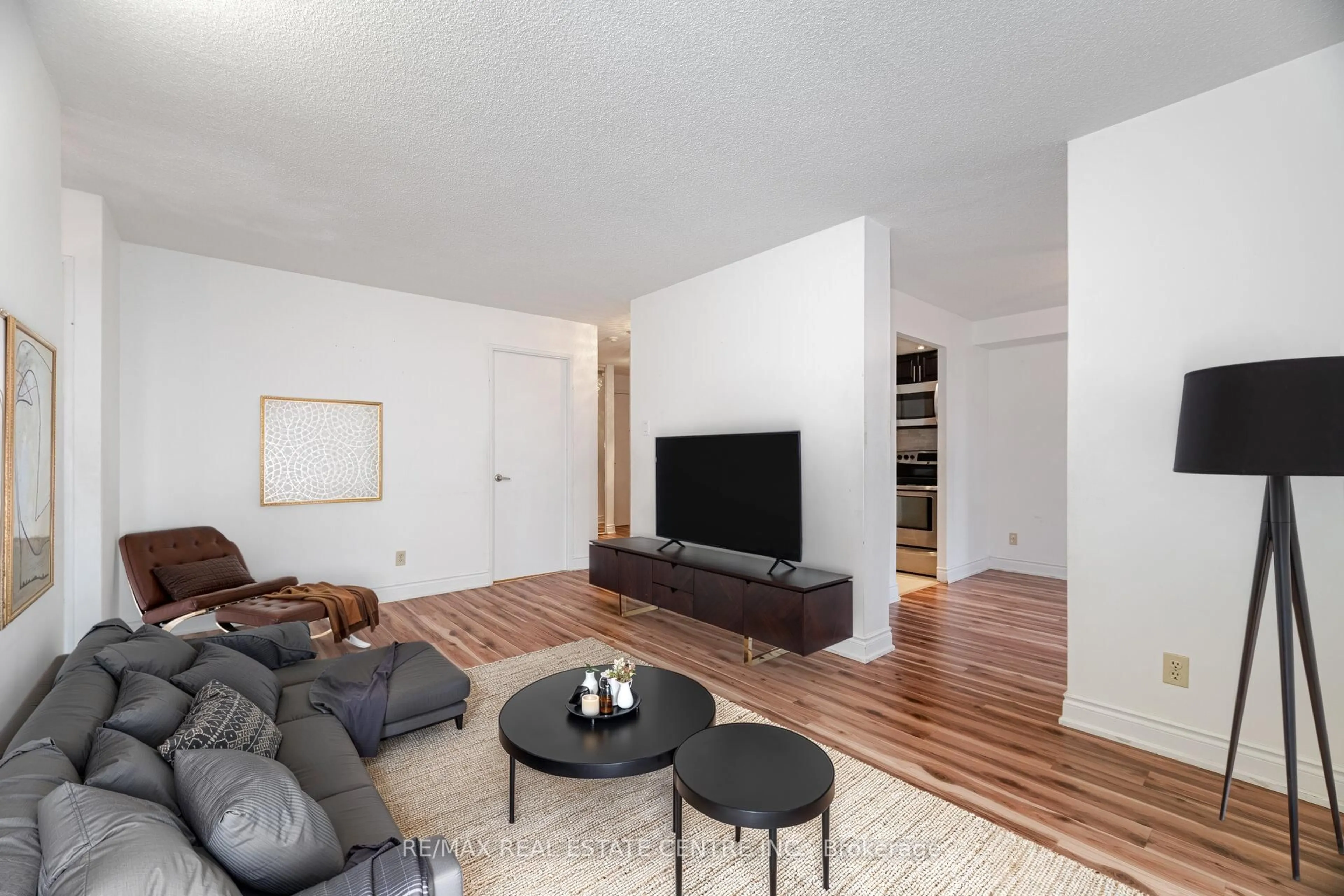 Living room with furniture, unknown for 115 Hillcrest Ave #811, Mississauga Ontario L5B 3Y9