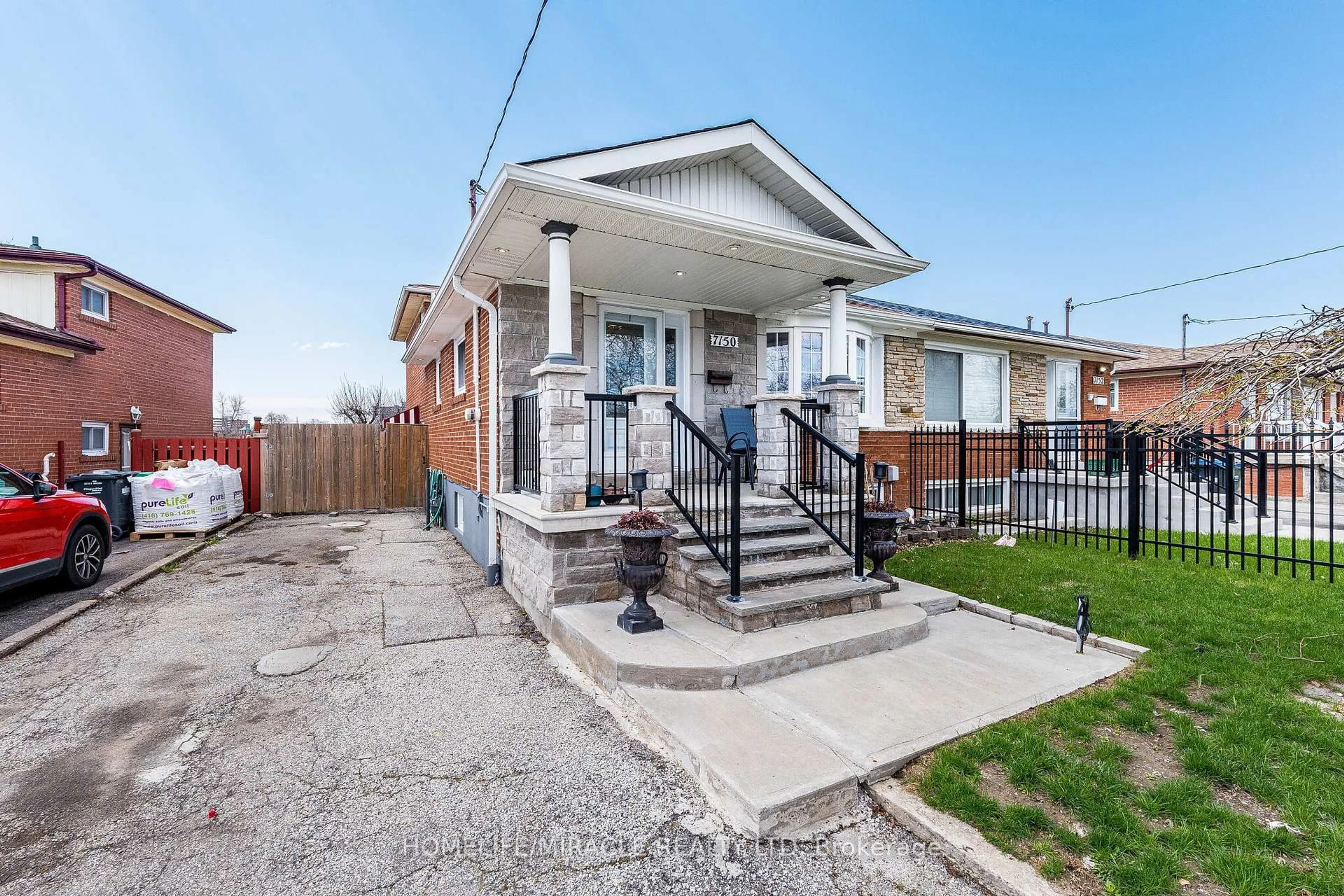 Home with brick exterior material, street for 7150 Harwick Dr, Mississauga Ontario L4T 3A4