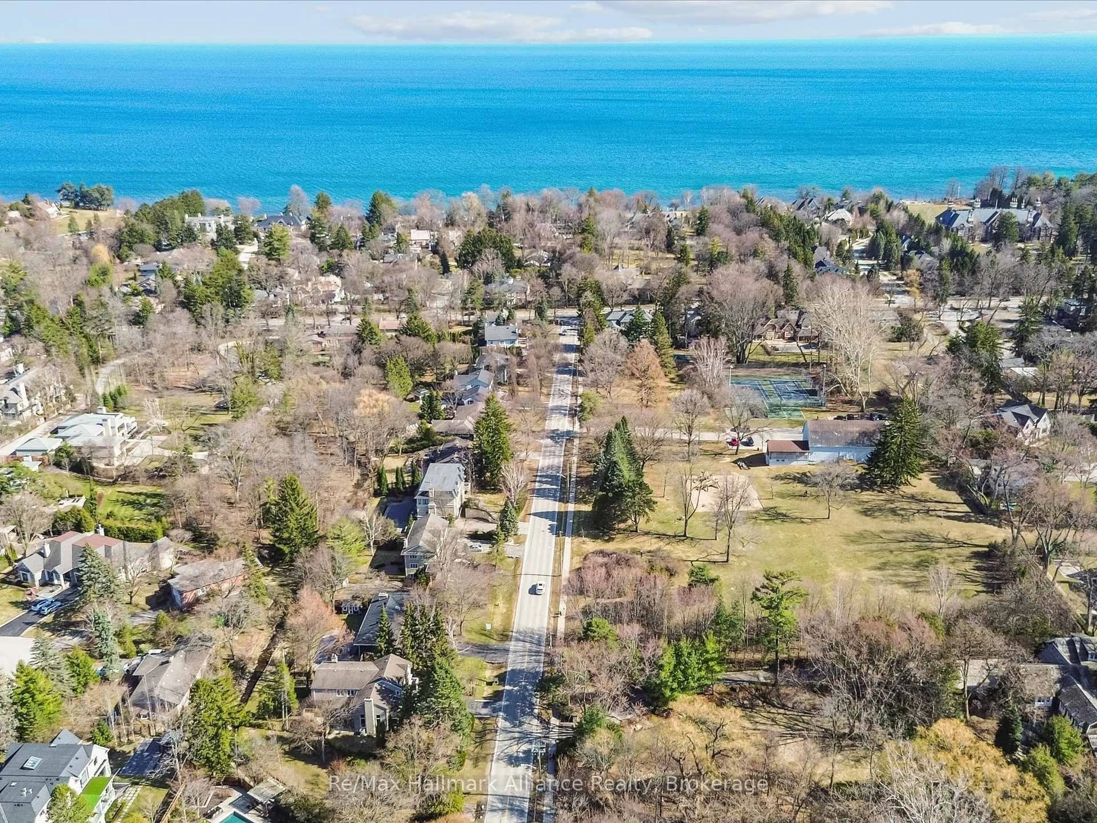 A pic from outside/outdoor area/front of a property/back of a property/a pic from drone, water/lake/river/ocean view for 169 Morrison Rd, Oakville Ontario L6J 4J3