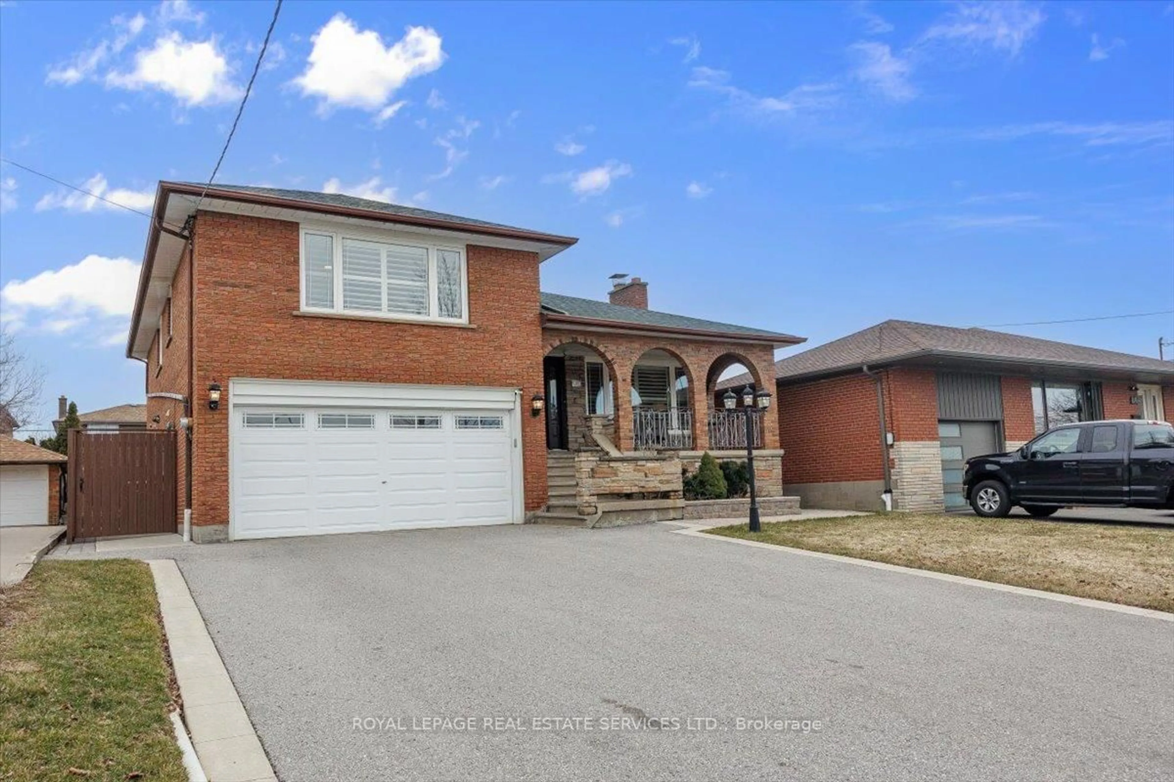 Home with brick exterior material, street for 91 Macleod St, Toronto Ontario M6L 2M8
