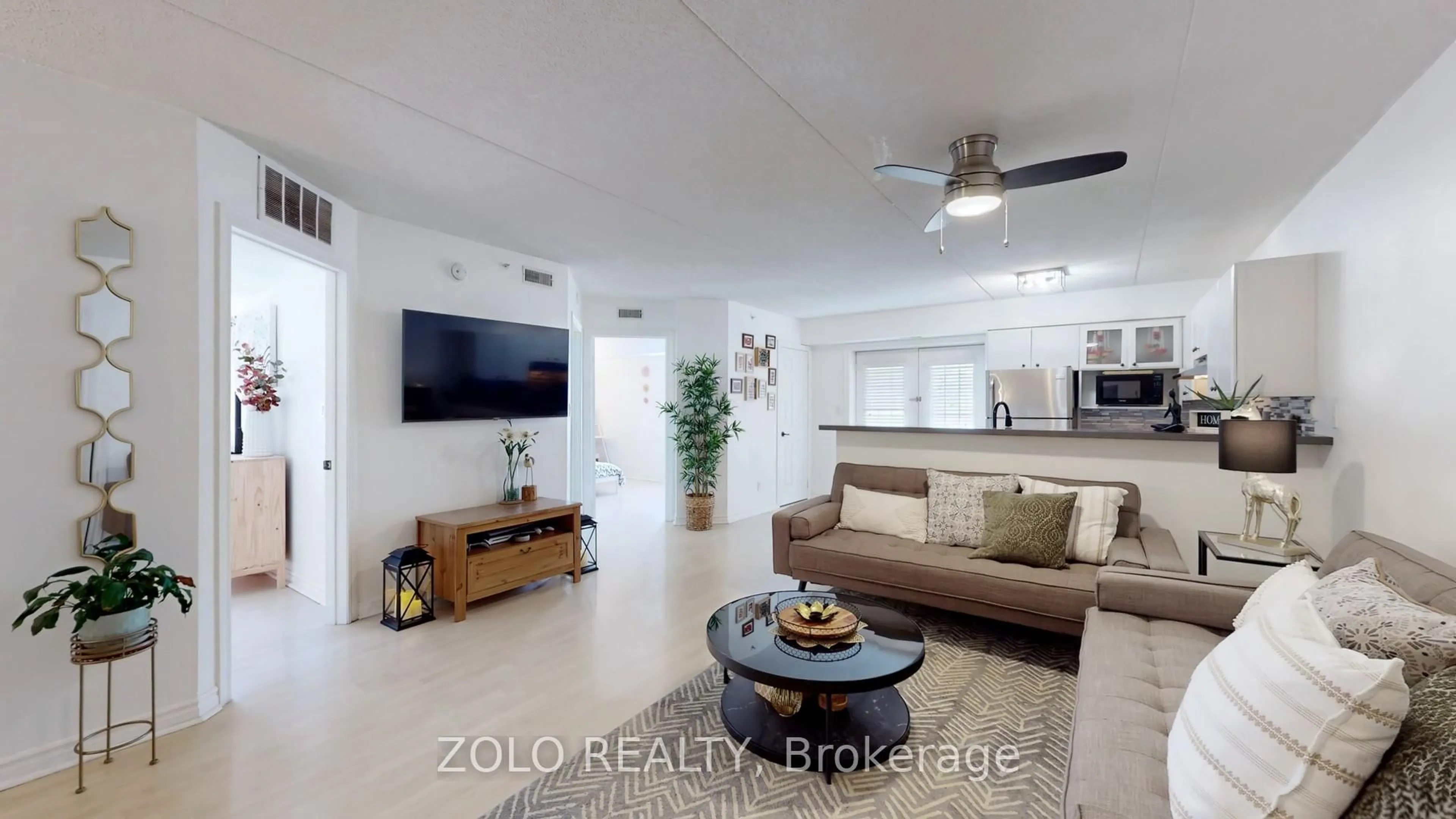 Living room with furniture, ceramic/tile floor for 4003 Kilmer Dr #111, Burlington Ontario L7M 4M1