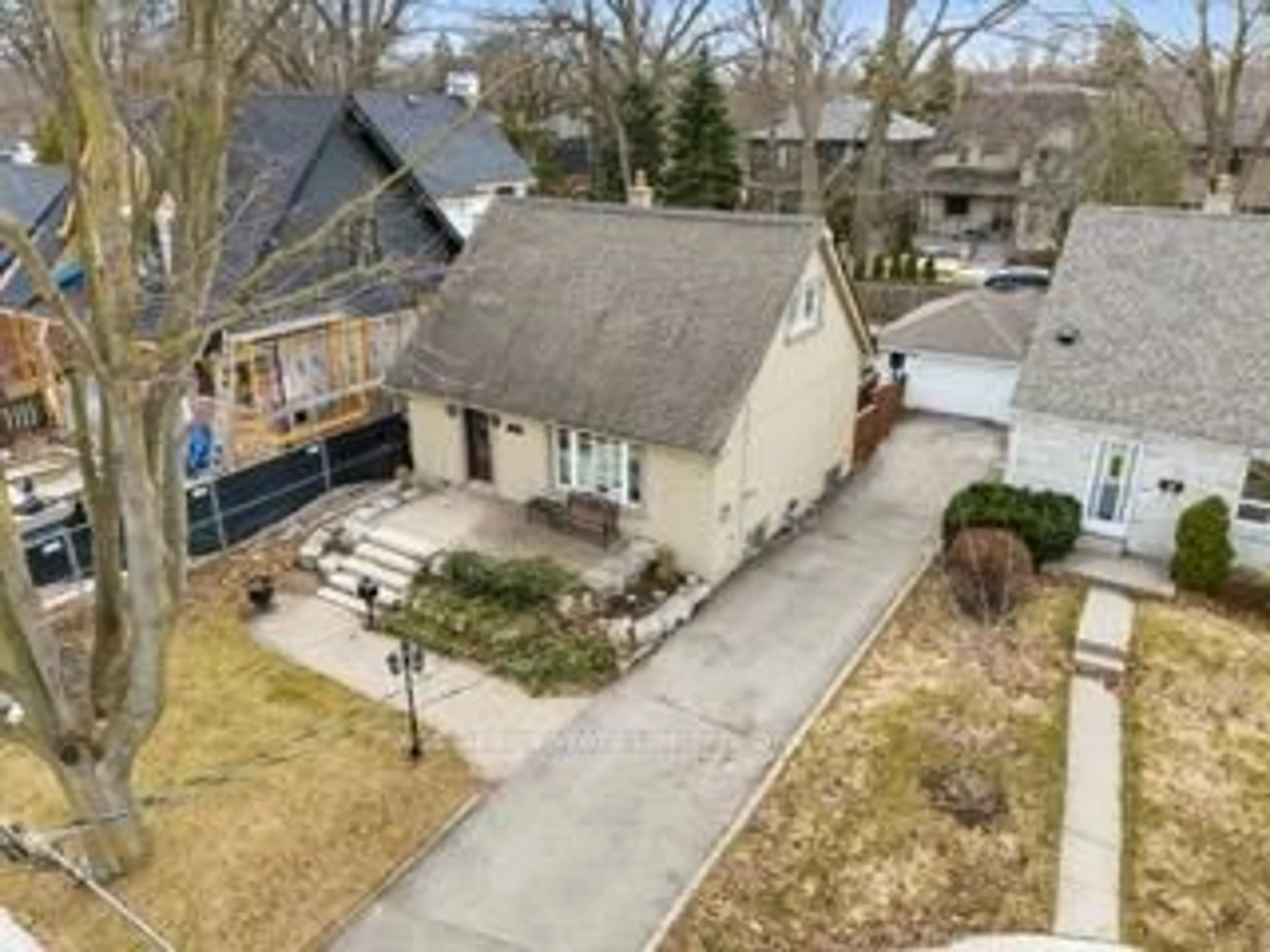 A pic from outside/outdoor area/front of a property/back of a property/a pic from drone, street for 11 Chelsea Dr, Toronto Ontario M8W 4R5