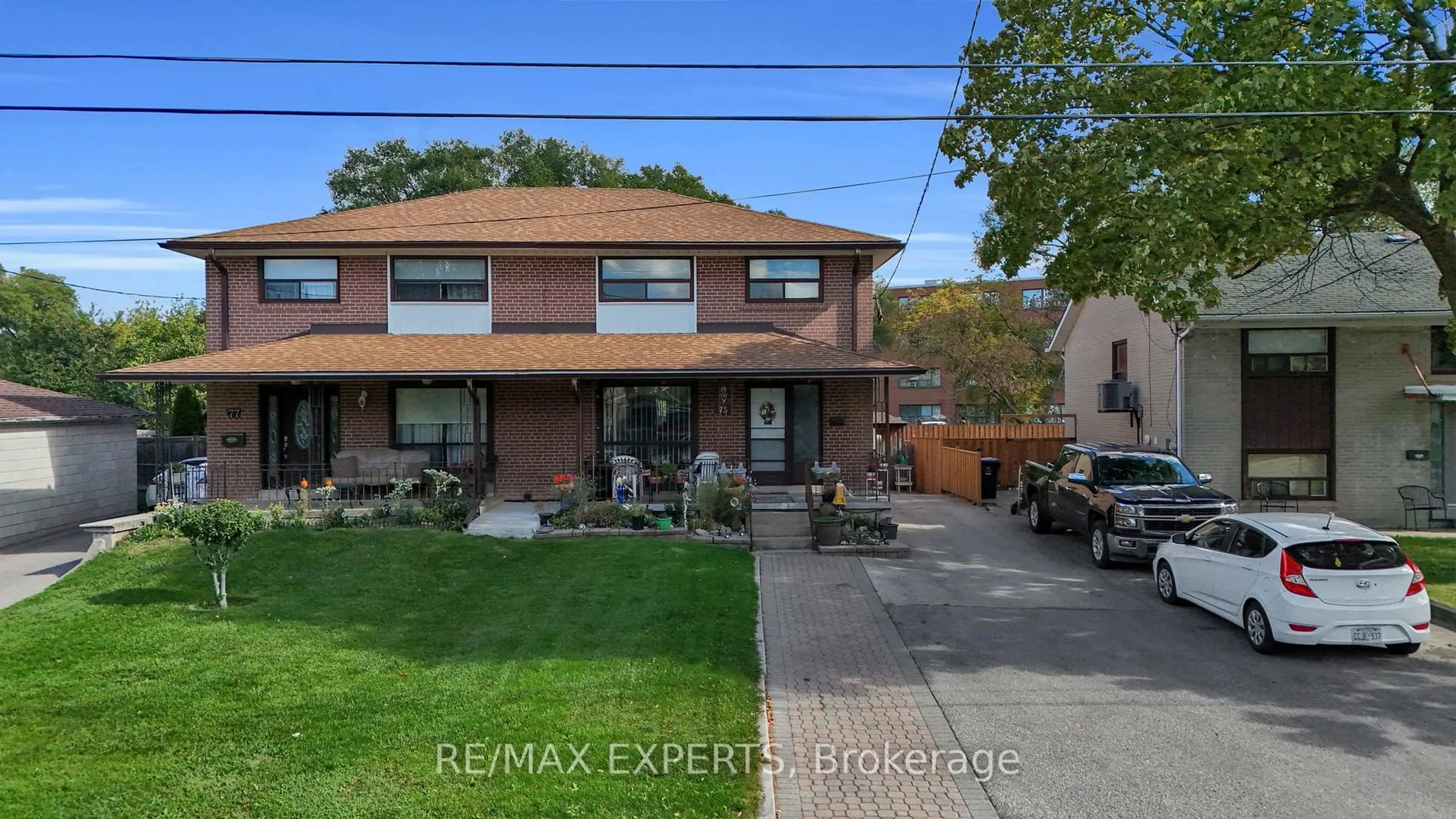 Home with brick exterior material, street for 75 St Lucie Dr, Toronto Ontario M9M 1T1