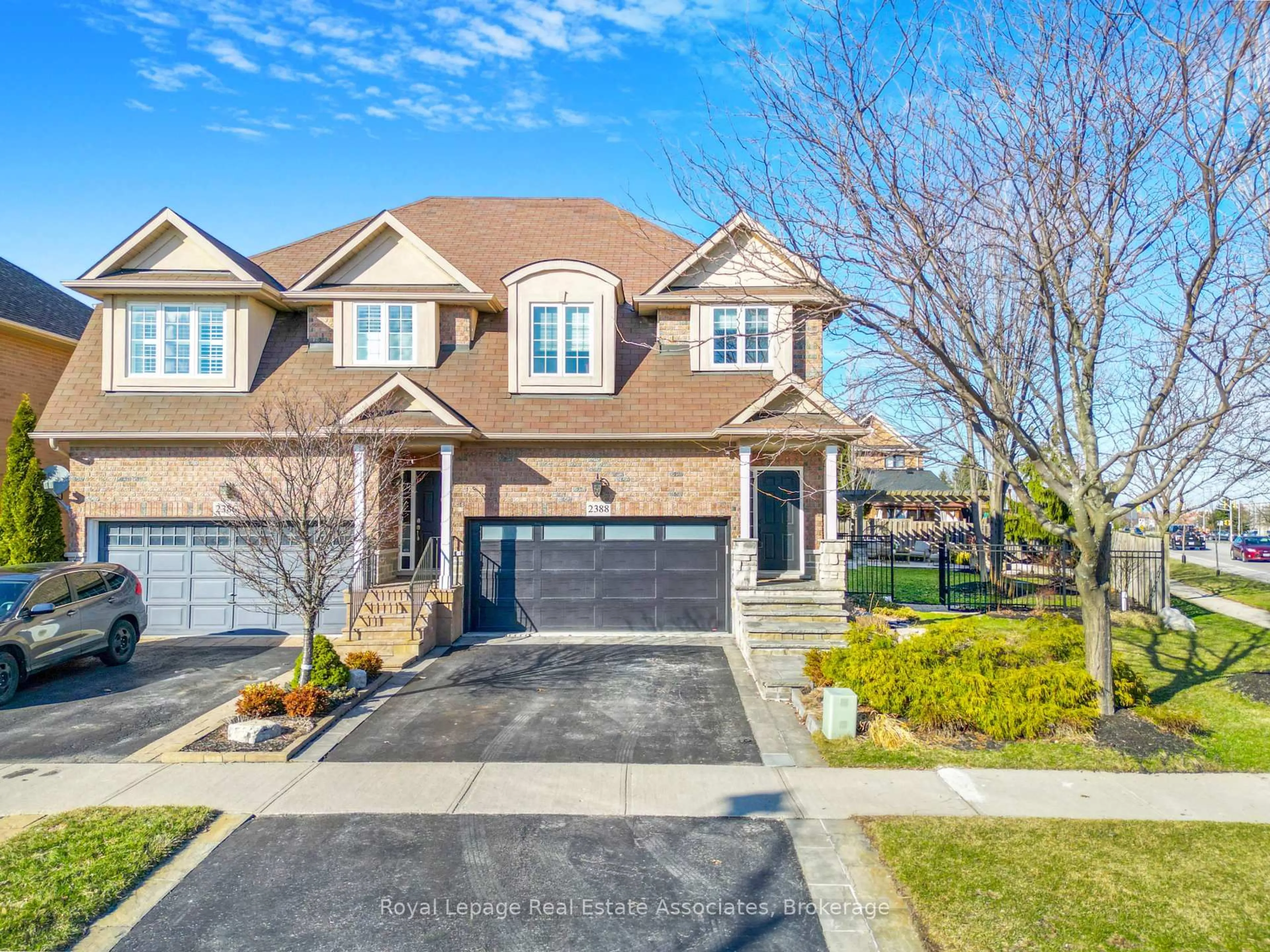 Home with brick exterior material, street for 2388 Stone Glen Cres, Oakville Ontario L6M 0C7