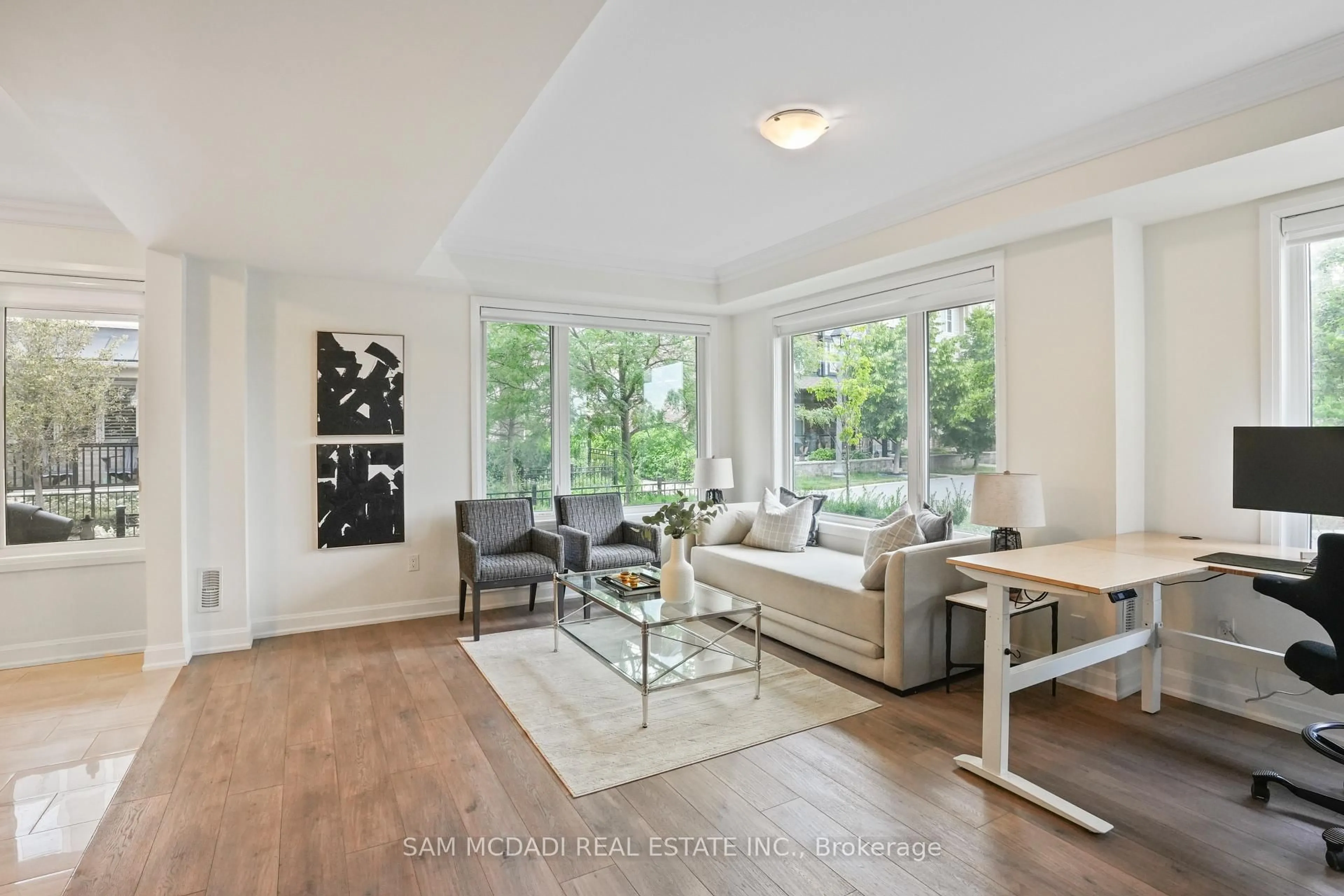 Living room with furniture, wood/laminate floor for 3006 Creekshore Common #34, Oakville Ontario L6M 0Y6