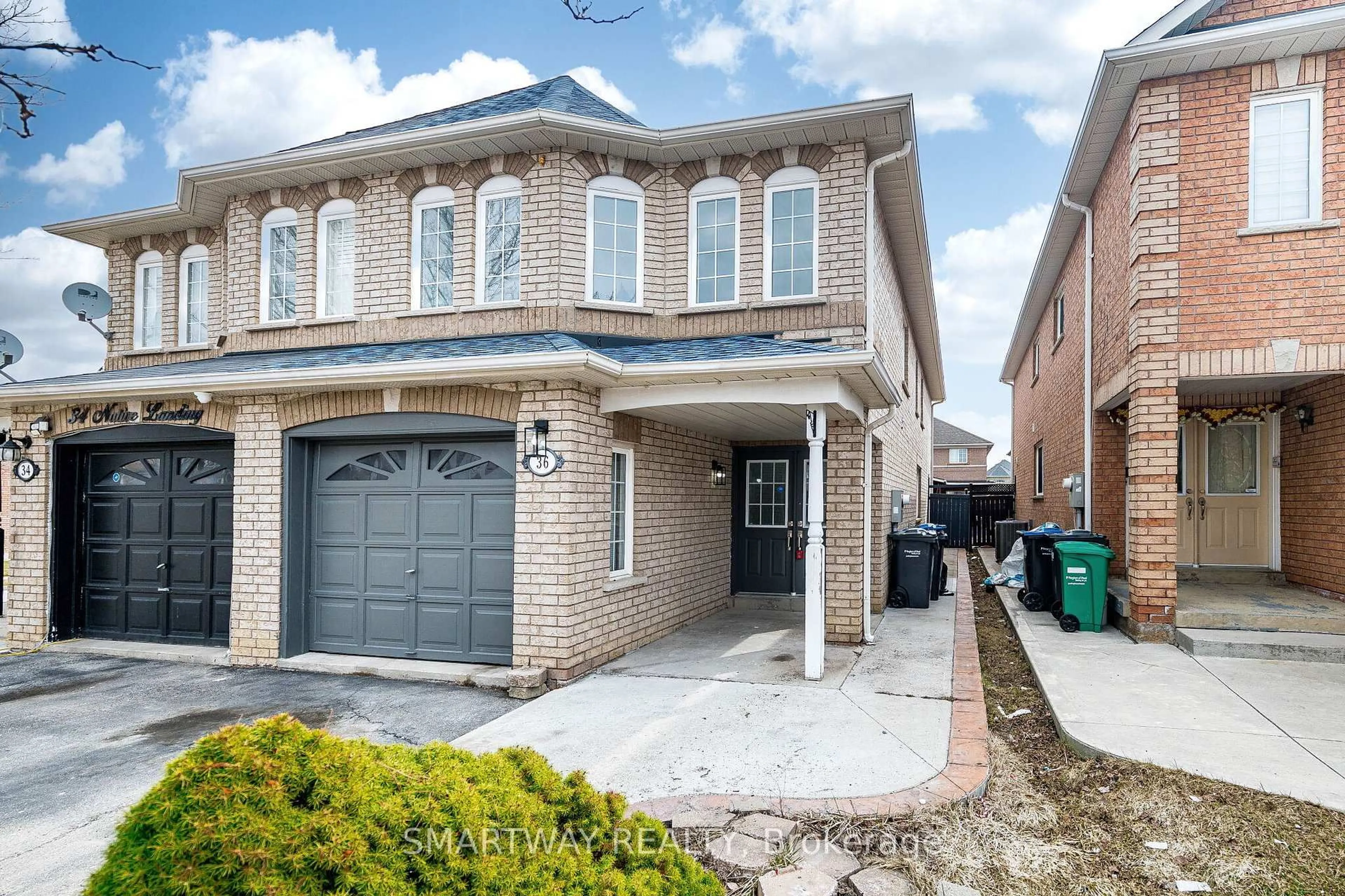 Home with brick exterior material, street for 36 Native Landing, Brampton Ontario L6X 5B1