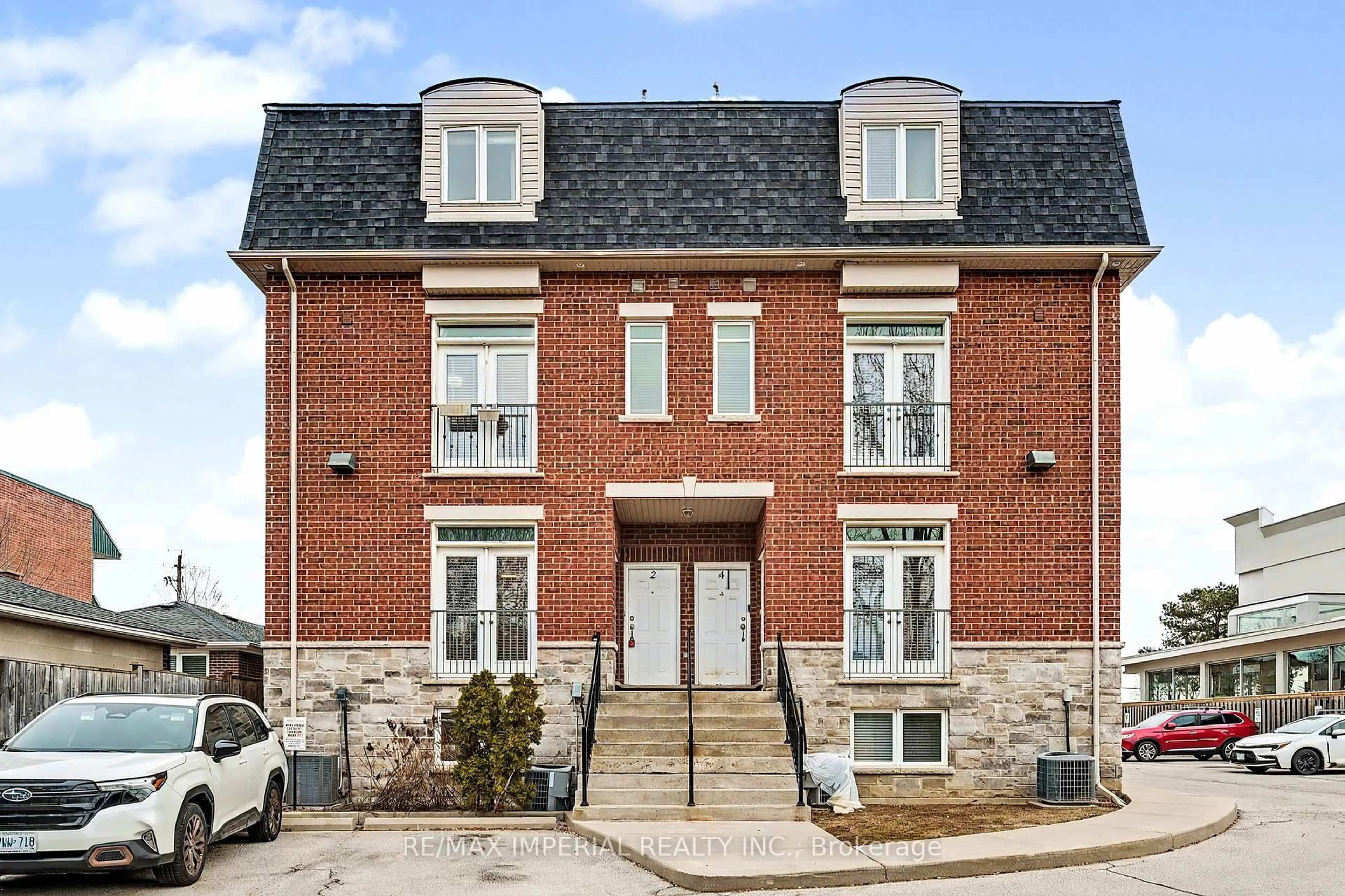 Home with brick exterior material, street for 2964 Islington Ave #2, Toronto Ontario M9L 2K6