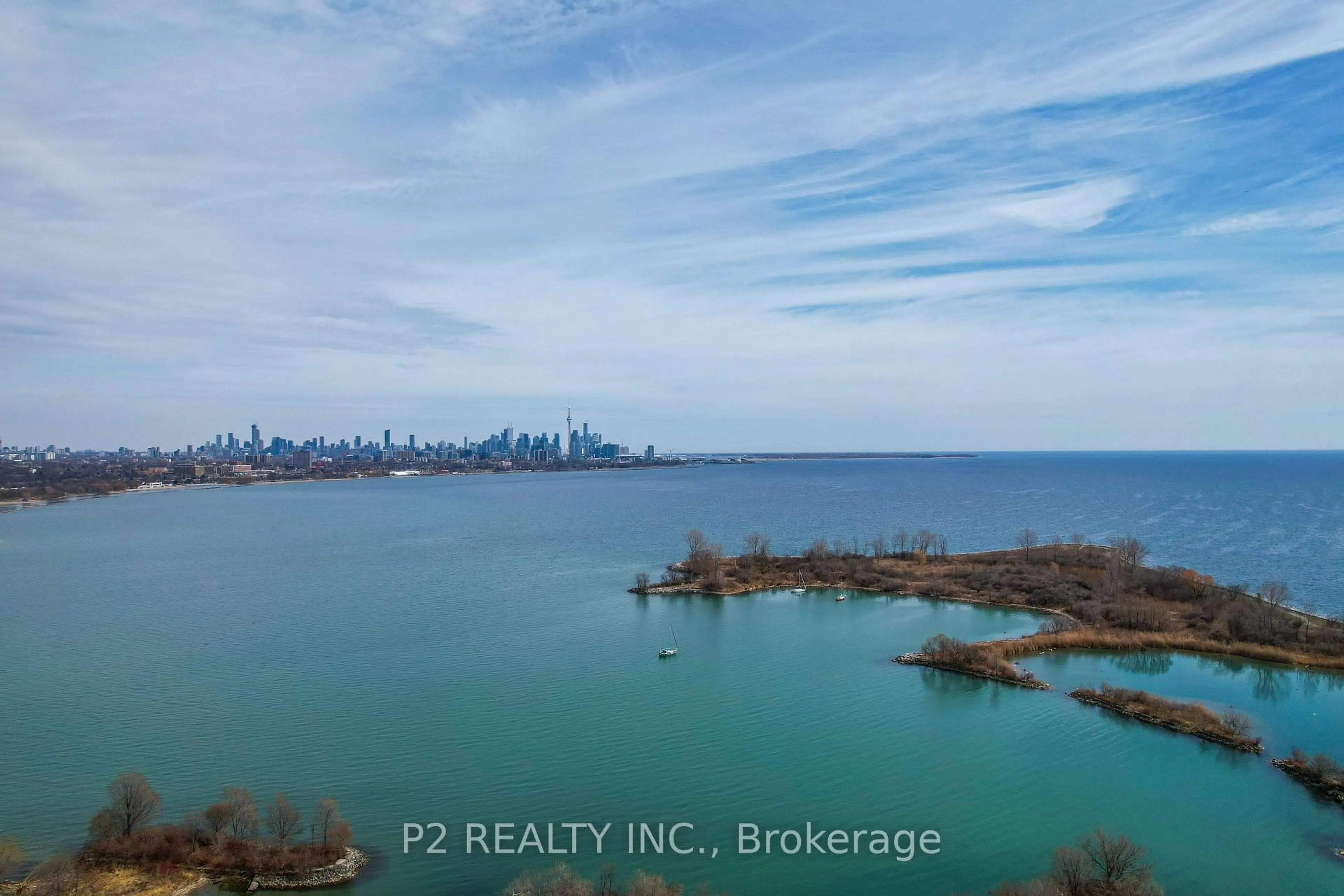 A pic from outside/outdoor area/front of a property/back of a property/a pic from drone, water/lake/river/ocean view for 70 Annie Craig Dr #3302, Toronto Ontario M8V 0G2