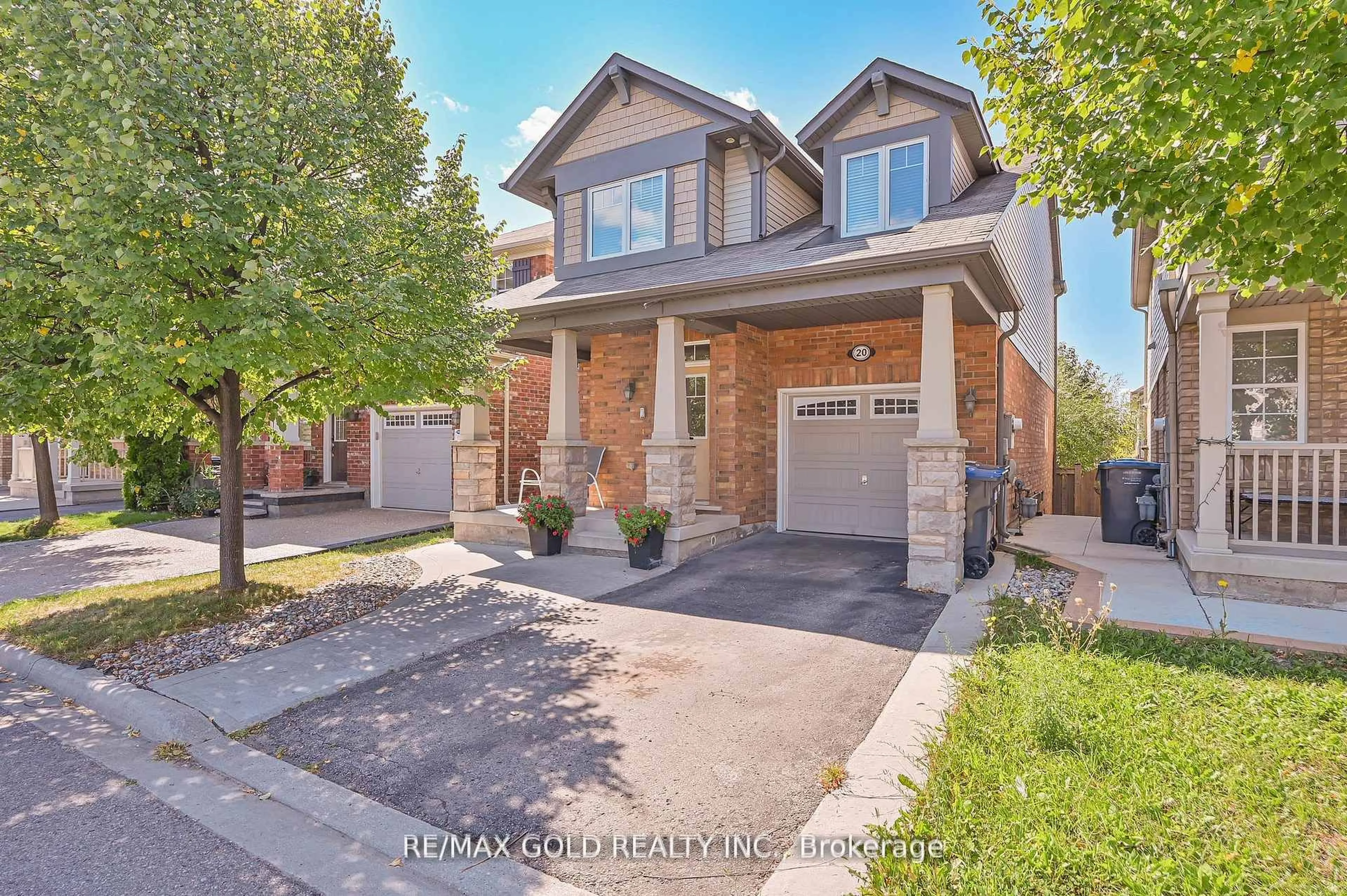 Home with brick exterior material, street for 20 Meadowcrest Lane, Brampton Ontario L7A 0T8