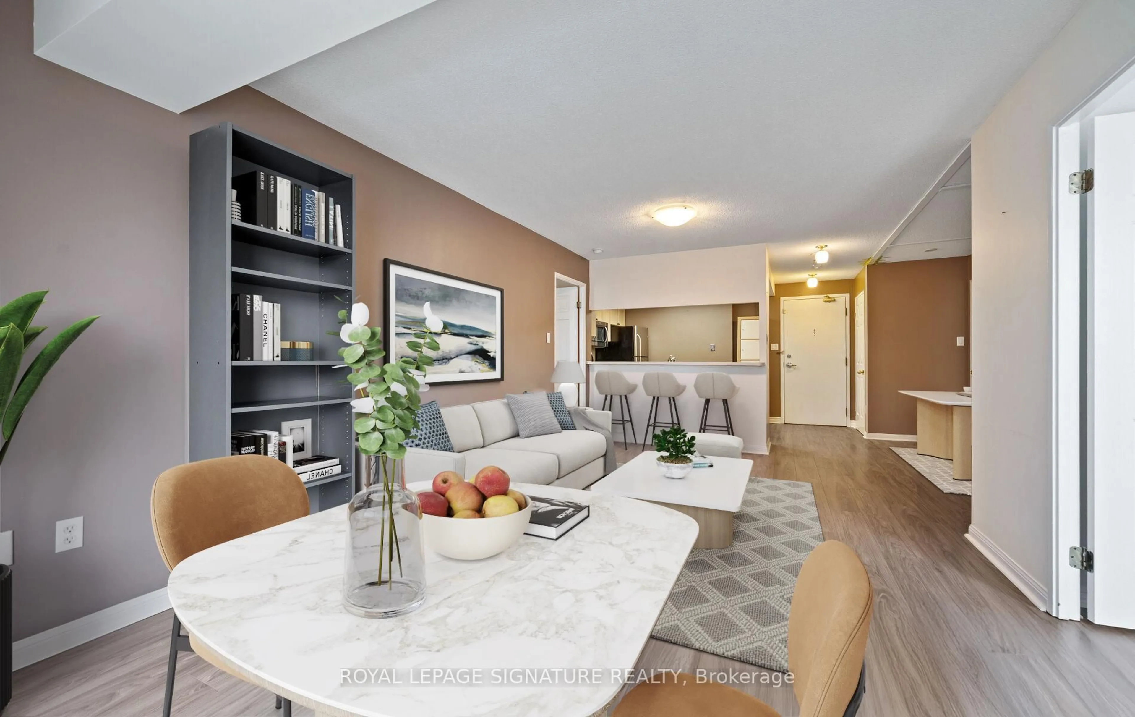 Living room with furniture, unknown for 101 Subway Cres #102, Toronto Ontario M9B 6K4