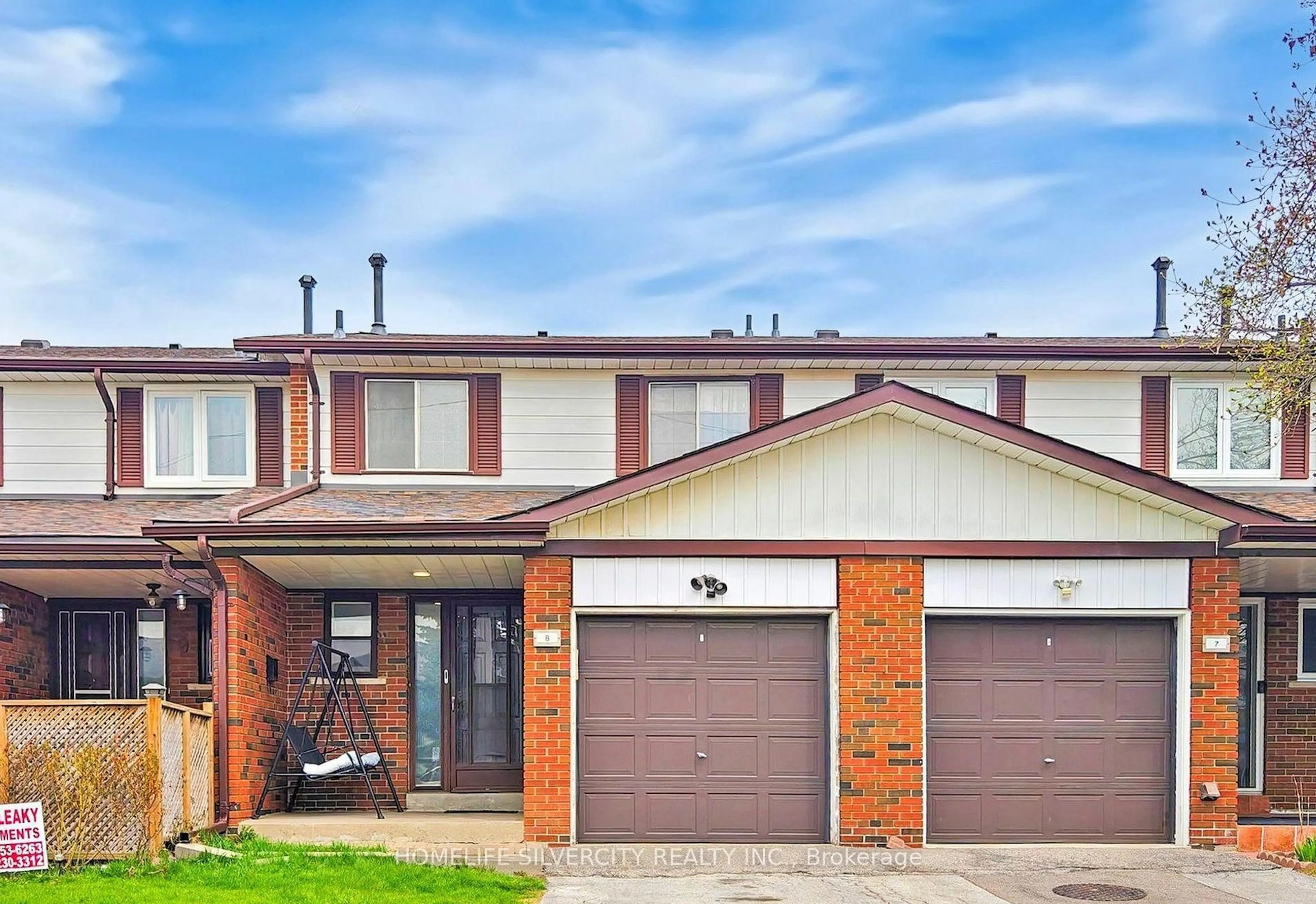 Home with brick exterior material, street for 7033 Netherbrae Rd #8, Mississauga Ontario L4T 2W2