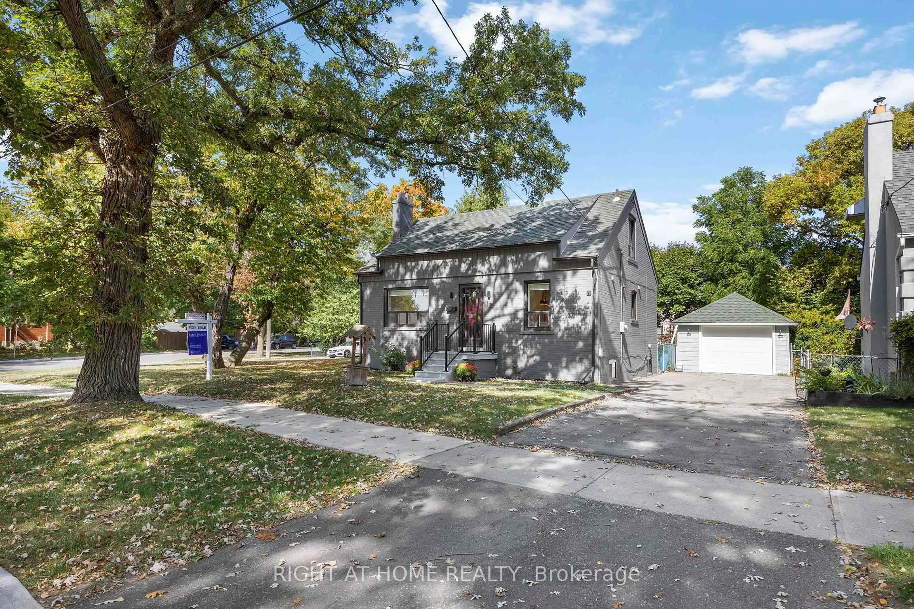 A pic from outside/outdoor area/front of a property/back of a property/a pic from drone, street for 12 Rosalie Ave, Toronto Ontario M3L 1C5