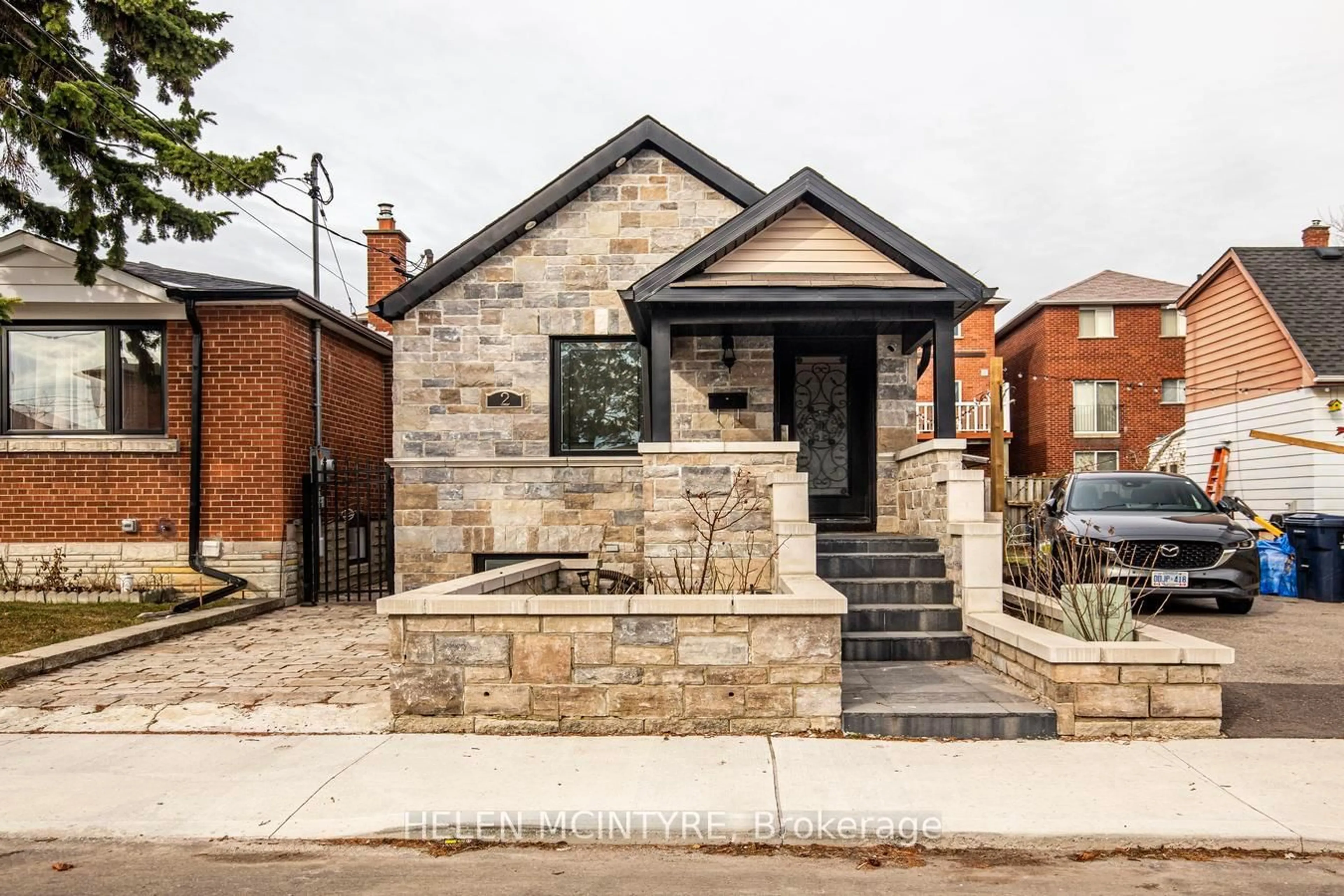 Home with brick exterior material, street for 2 Birch Tree Cres, Toronto Ontario M6M 2K8