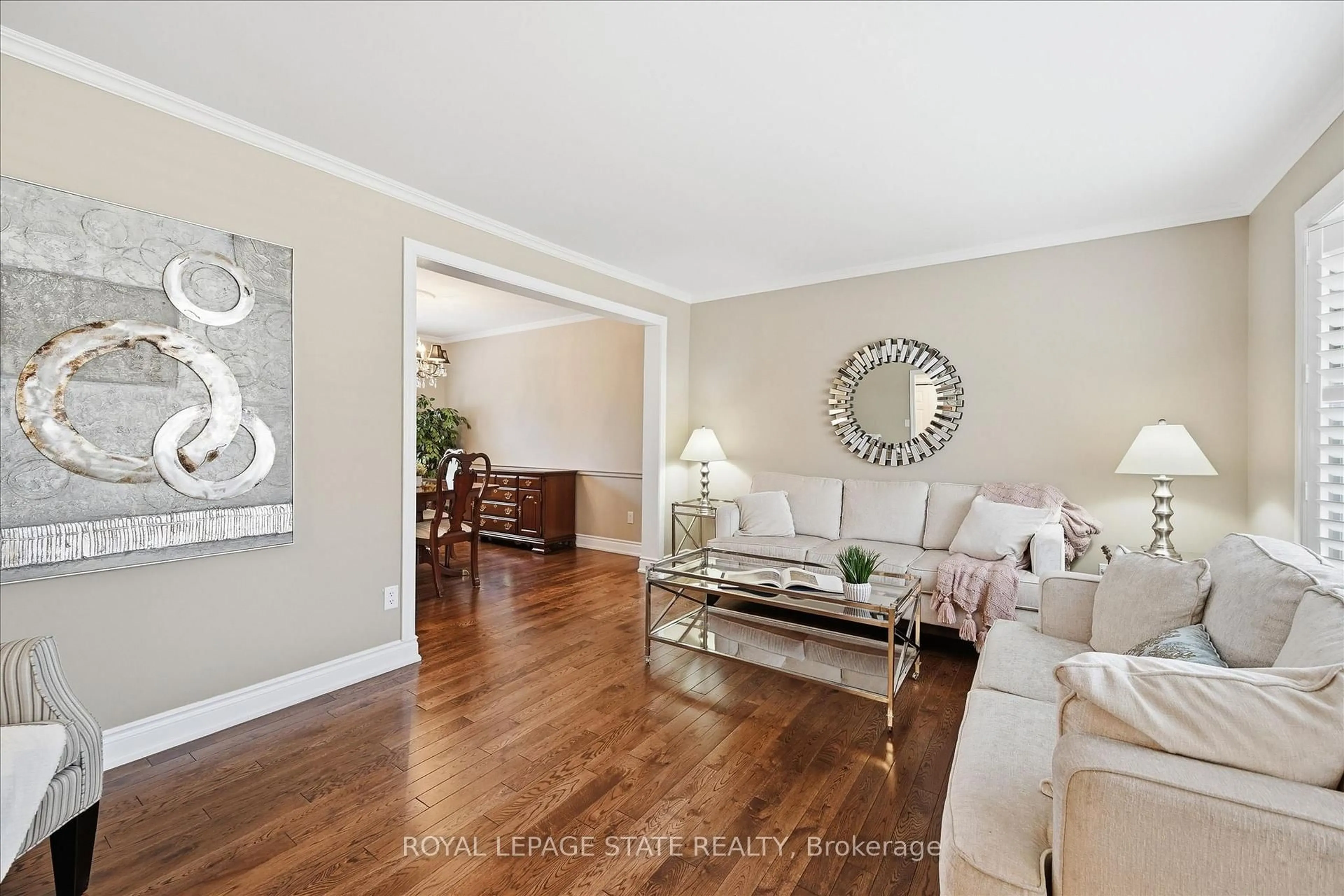 Living room with furniture, wood/laminate floor for 2192 Ireland Dr, Burlington Ontario L7P 3G1