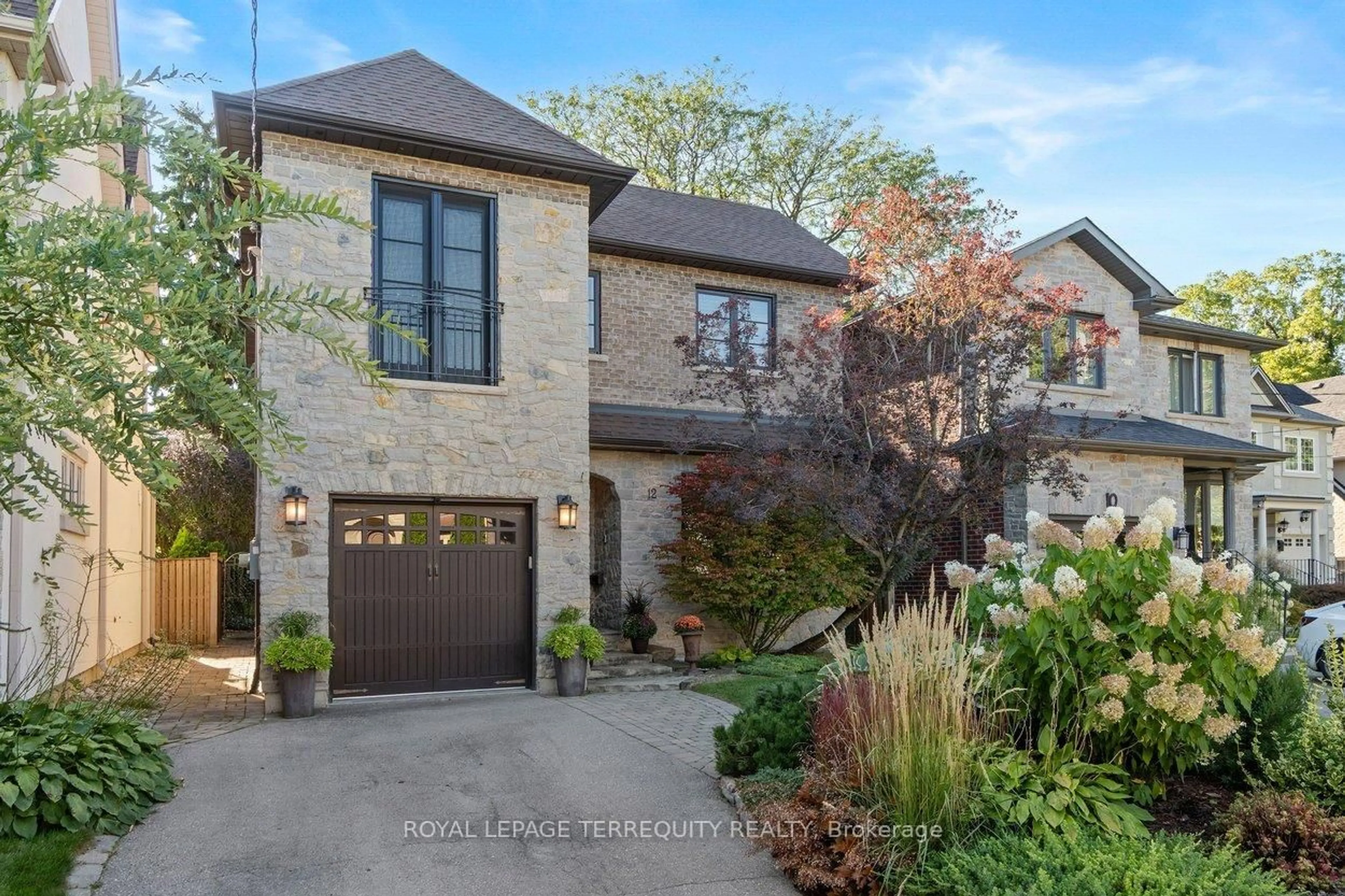 Home with brick exterior material, street for 12 Elliott Ave, Toronto Ontario M8X 2P8