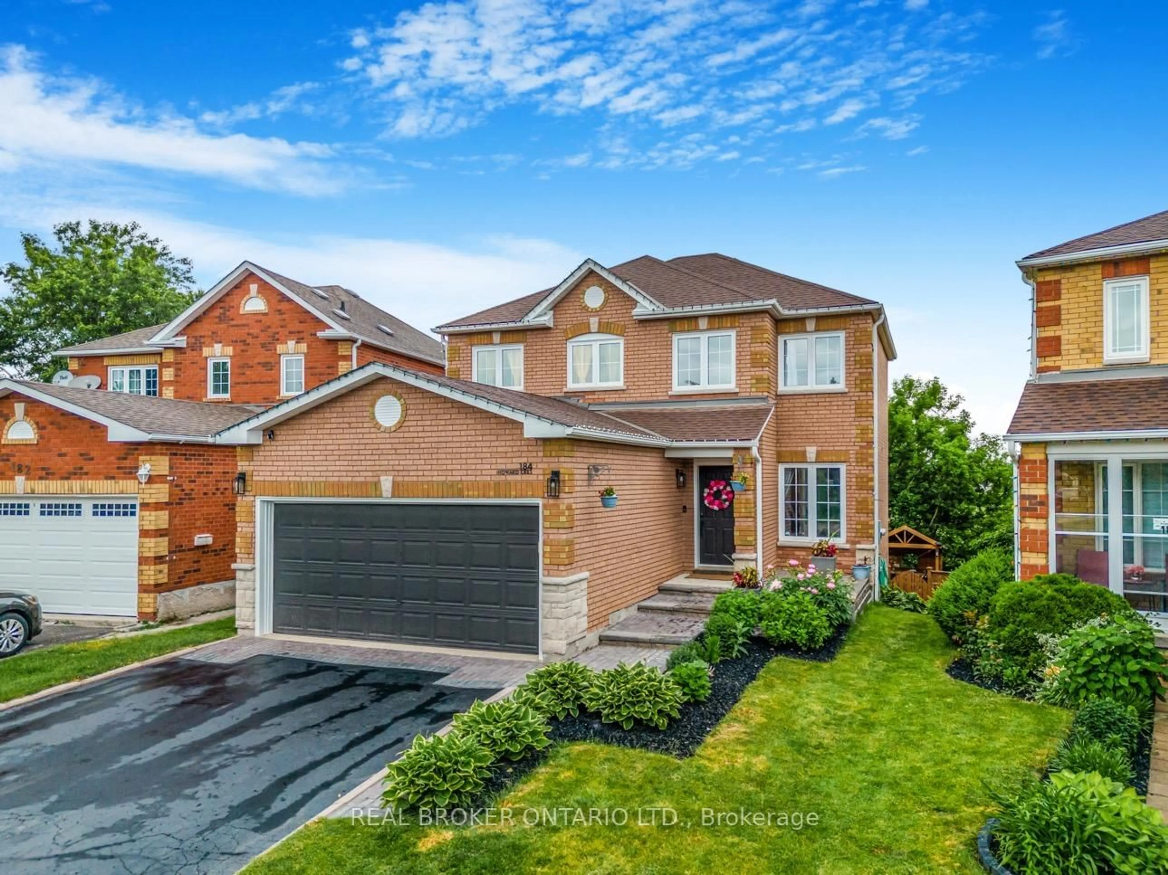 Home with brick exterior material, street for 184 Howard Cres, Orangeville Ontario L9W 4W3