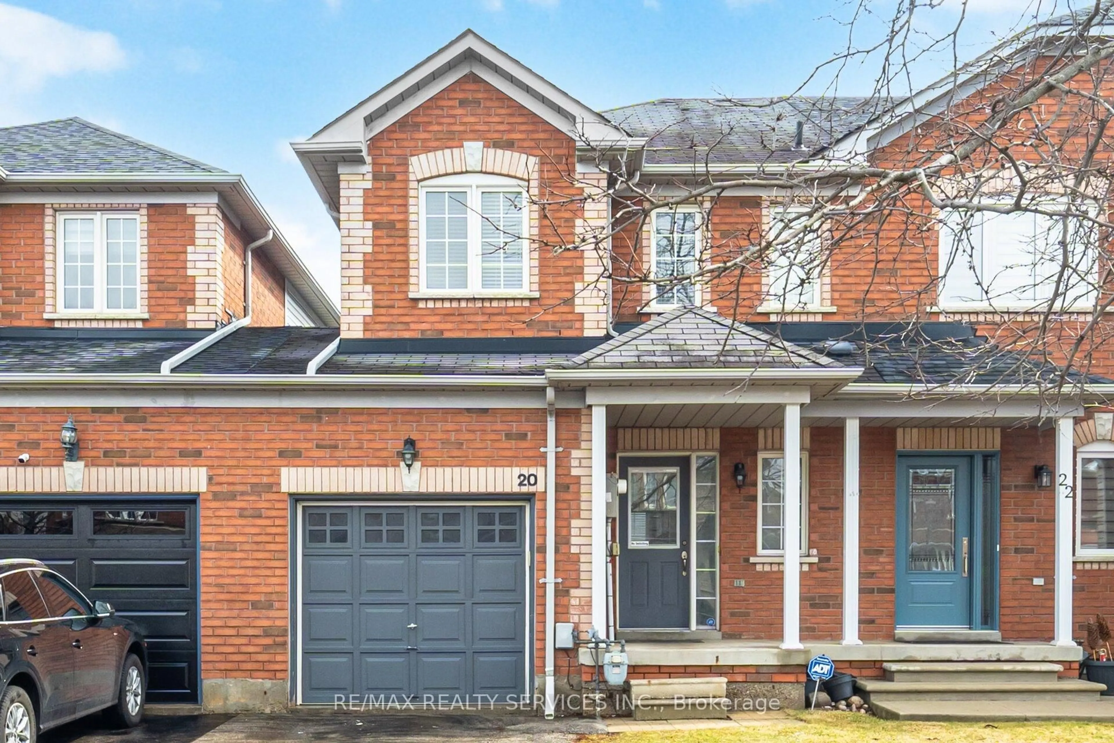 Home with brick exterior material, street for 20 Mossgrove Cres, Brampton Ontario L7A 1R1