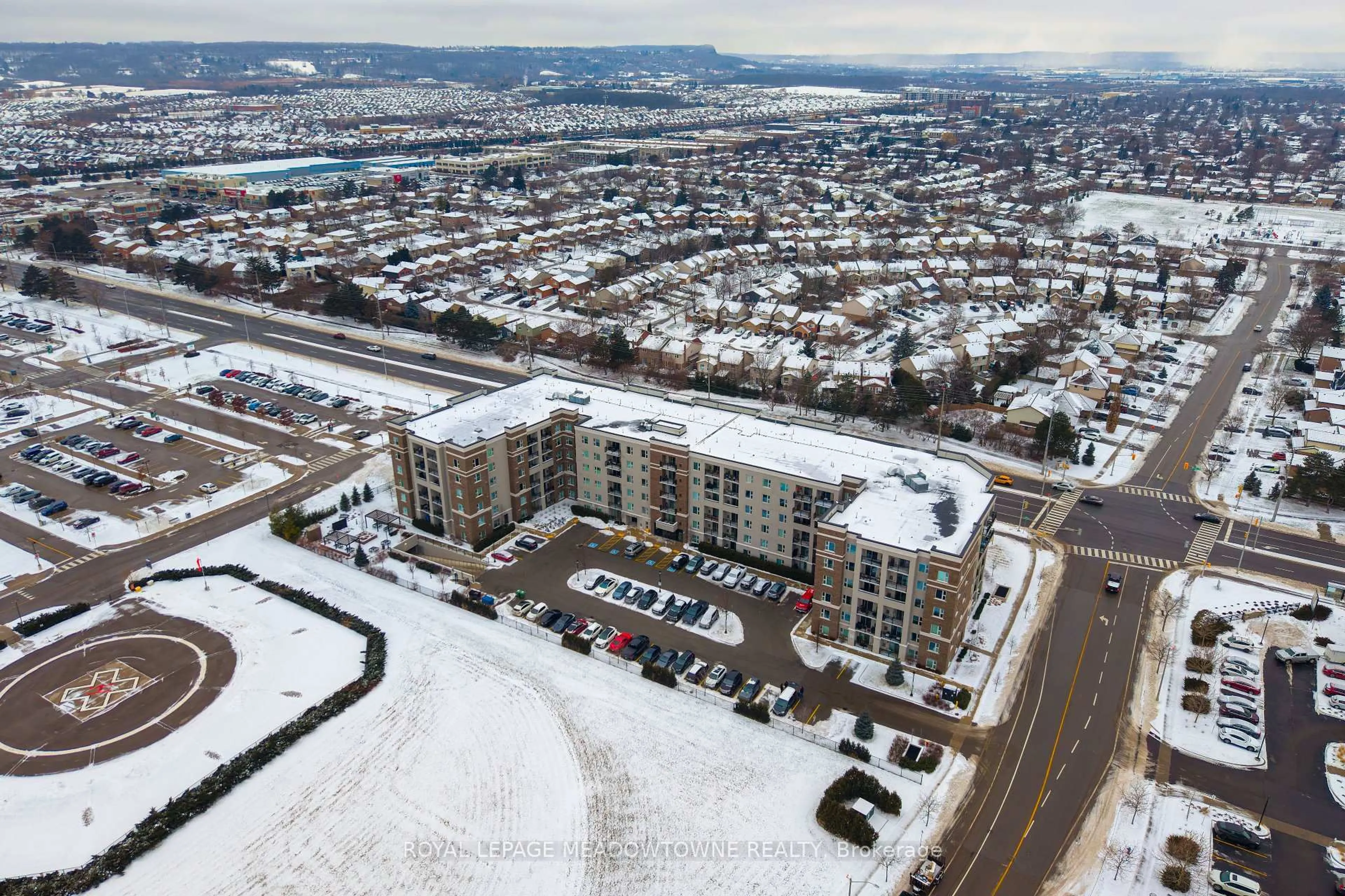 A pic from outside/outdoor area/front of a property/back of a property/a pic from drone, unknown for 610 Farmstead Dr #324, Milton Ontario L9T 8X5
