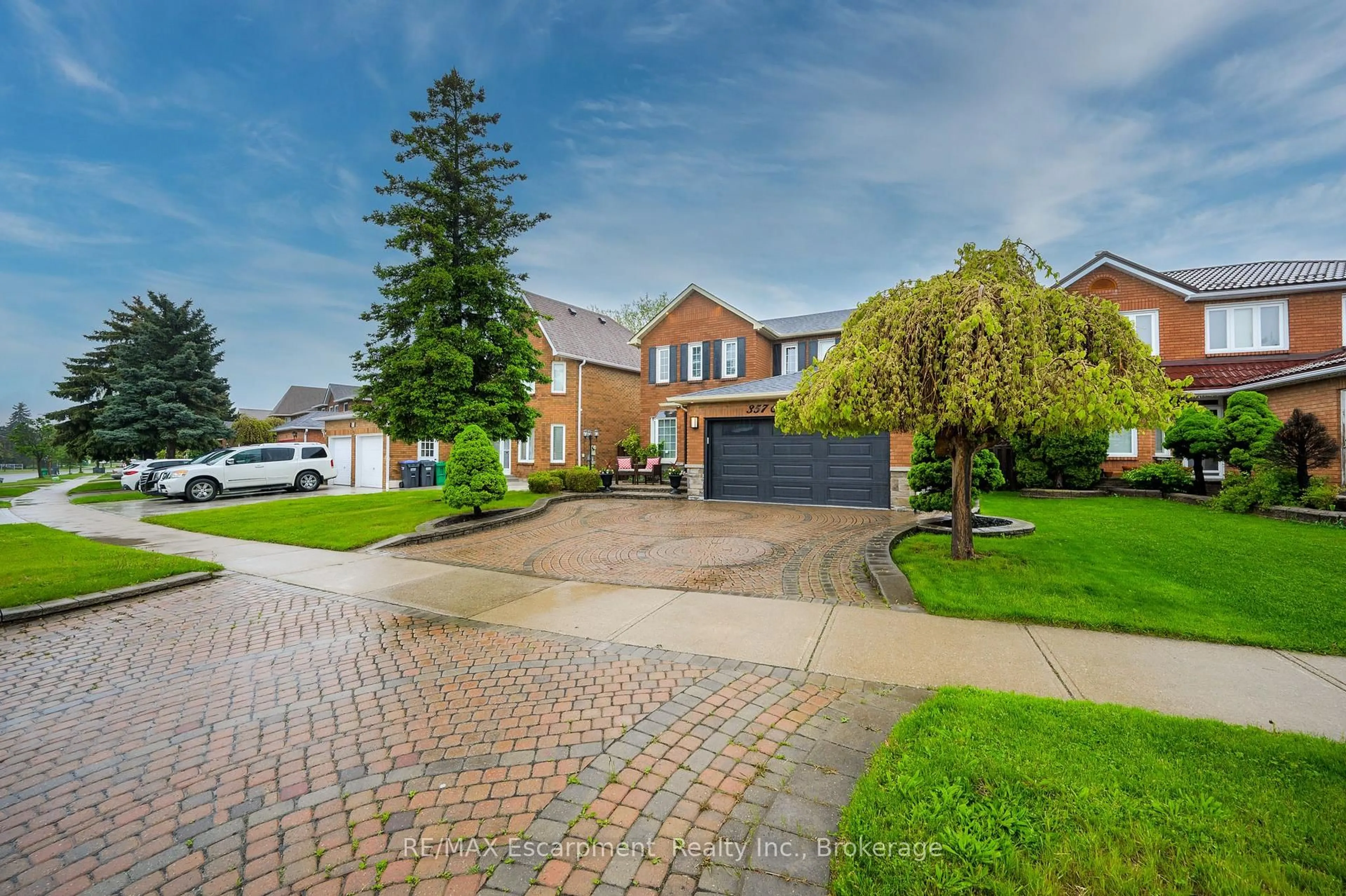 Home with brick exterior material, street for 357 Nahani Way, Mississauga Ontario L4Z 3B1