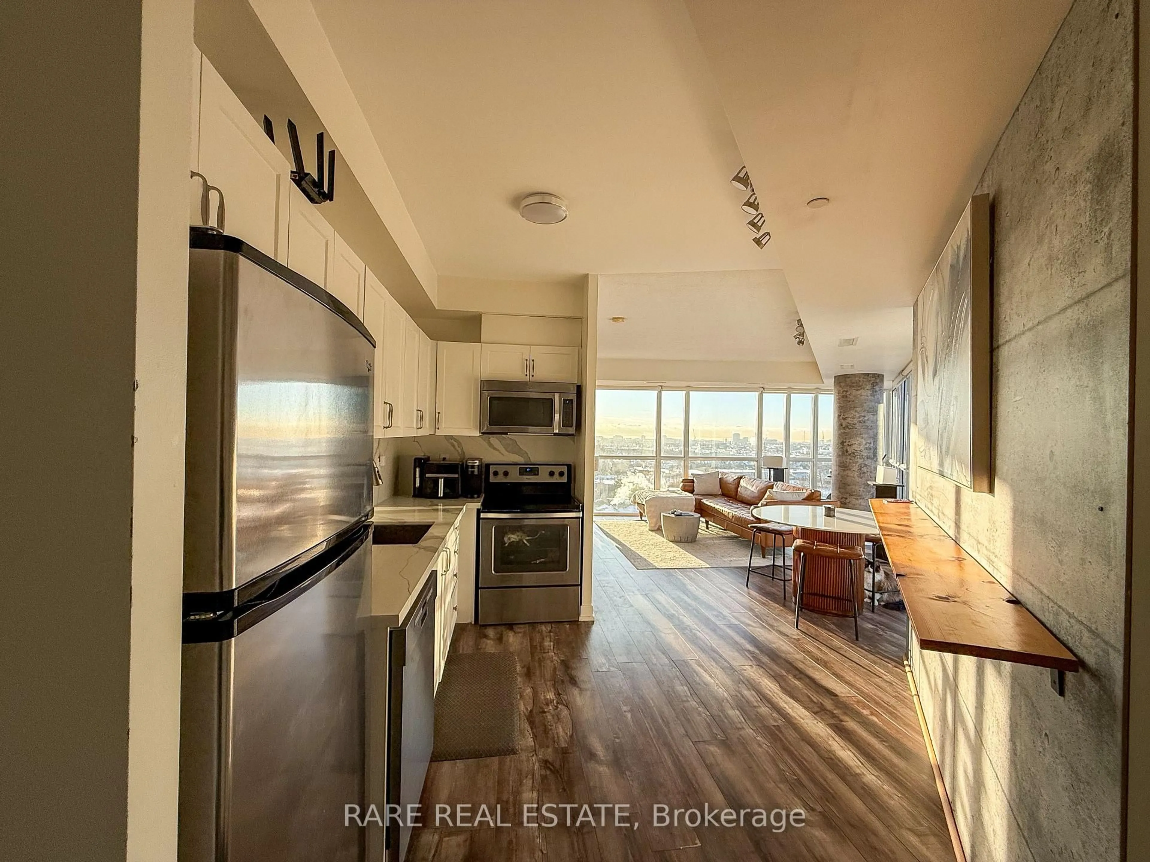 Open concept kitchen, wood/laminate floor for 5101 Dundas St #1009, Toronto Ontario M9A 5G8