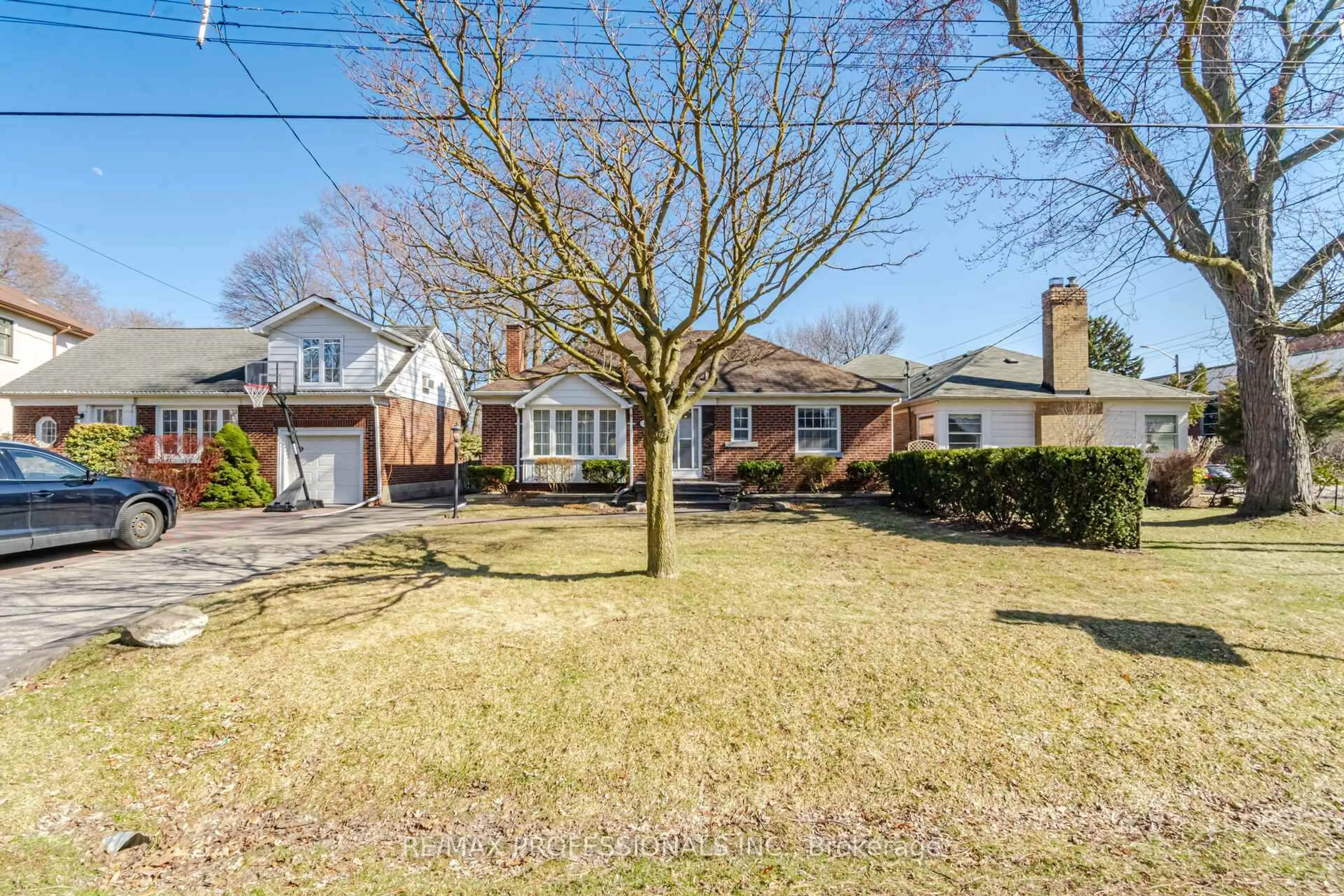 Home with brick exterior material, street for 1 Loyalist Rd, Toronto Ontario M9A 3P2