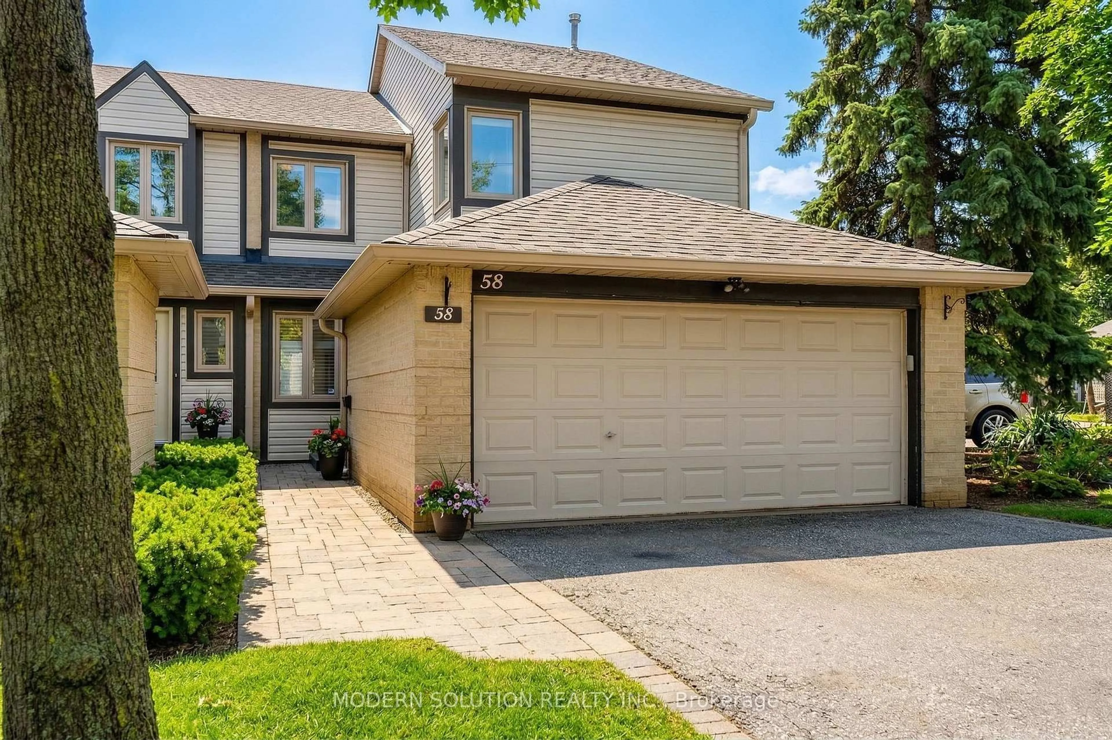 Home with brick exterior material, street for 2275 Credit Valley Rd #58, Mississauga Ontario L5M 4N5