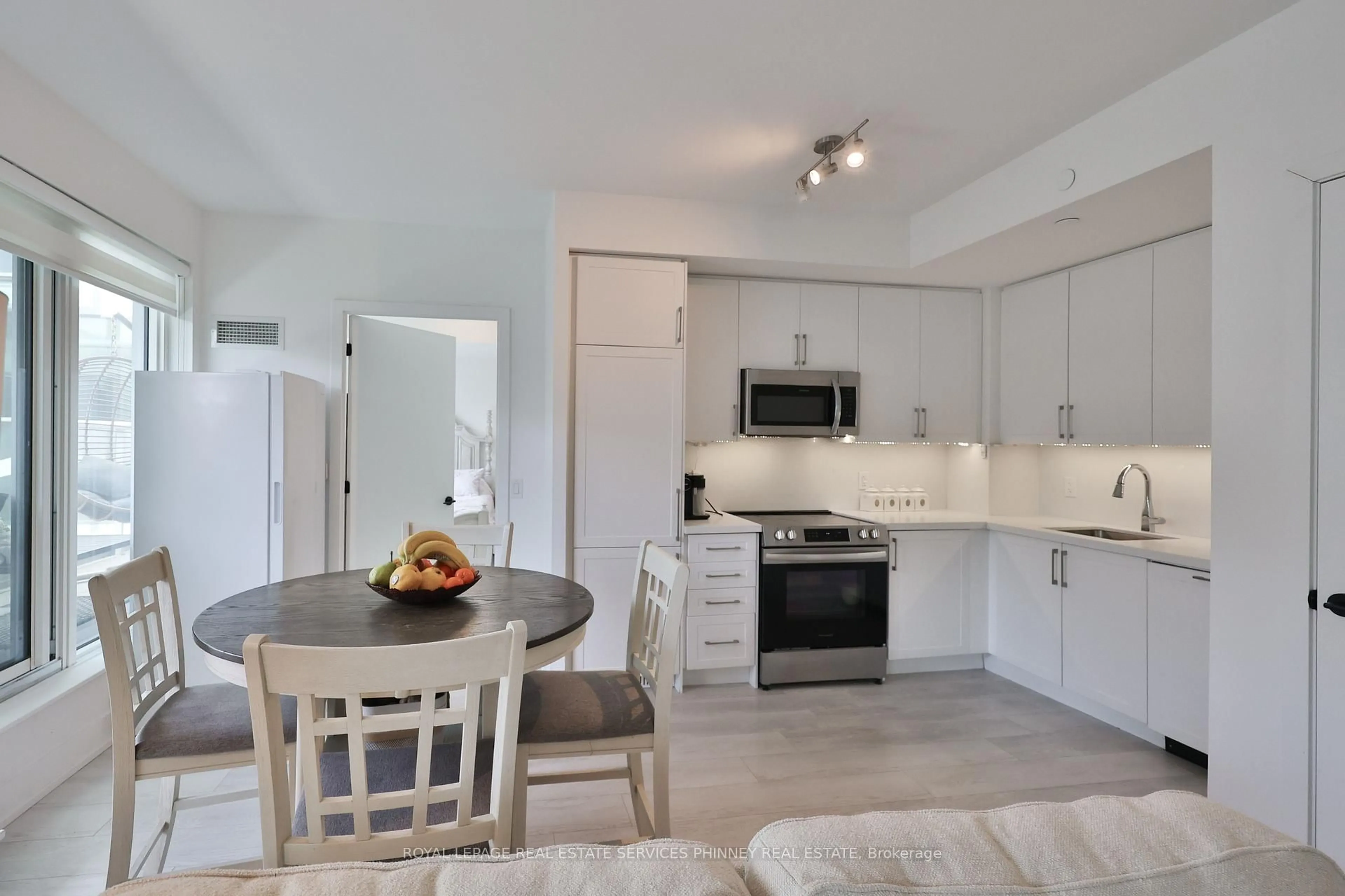 Open concept kitchen, unknown for 2450 Old Bronte Rd #716, Oakville Ontario L6M 4J2