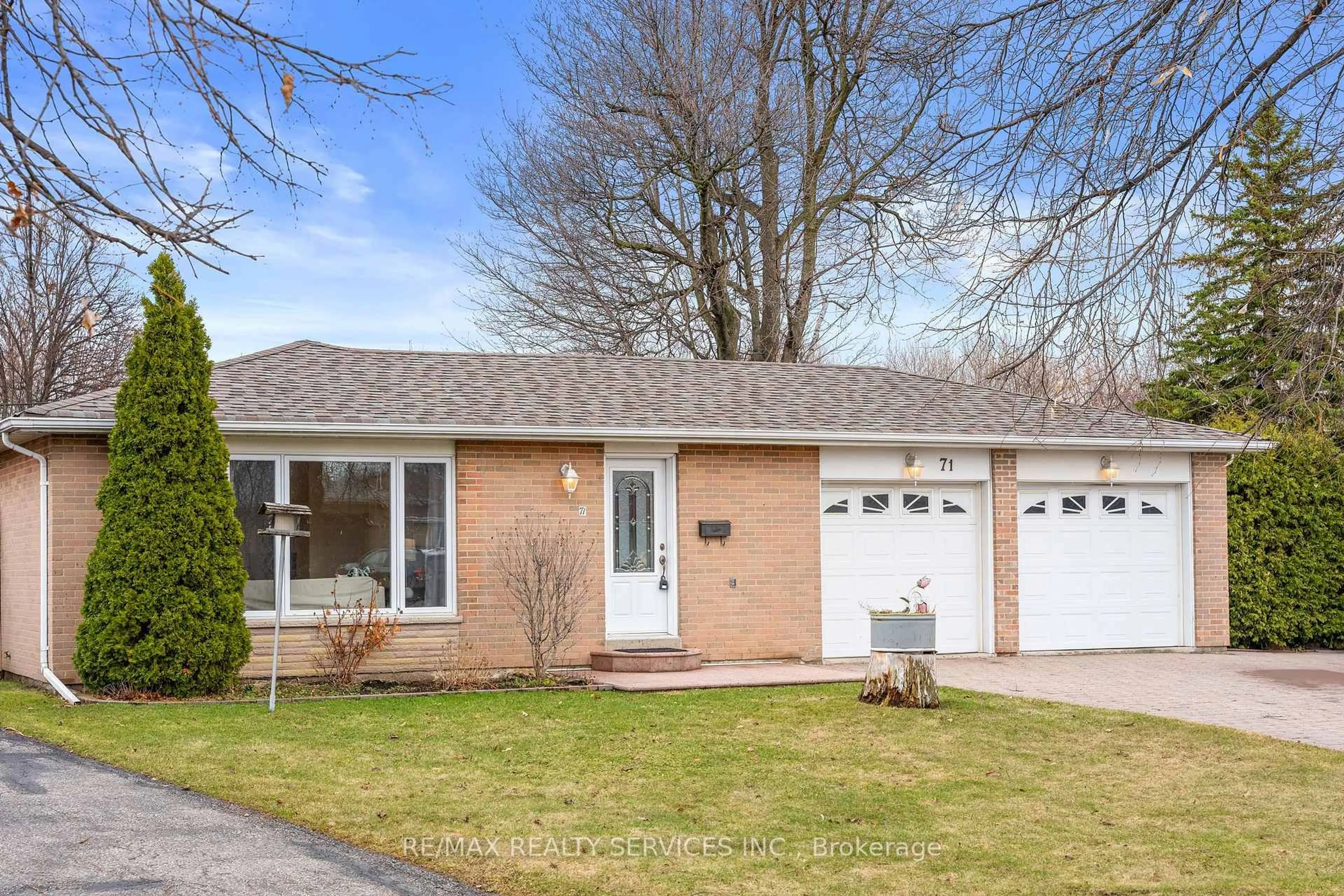 Home with brick exterior material, street for 71 Belmont Dr, Brampton Ontario L6T 2K5