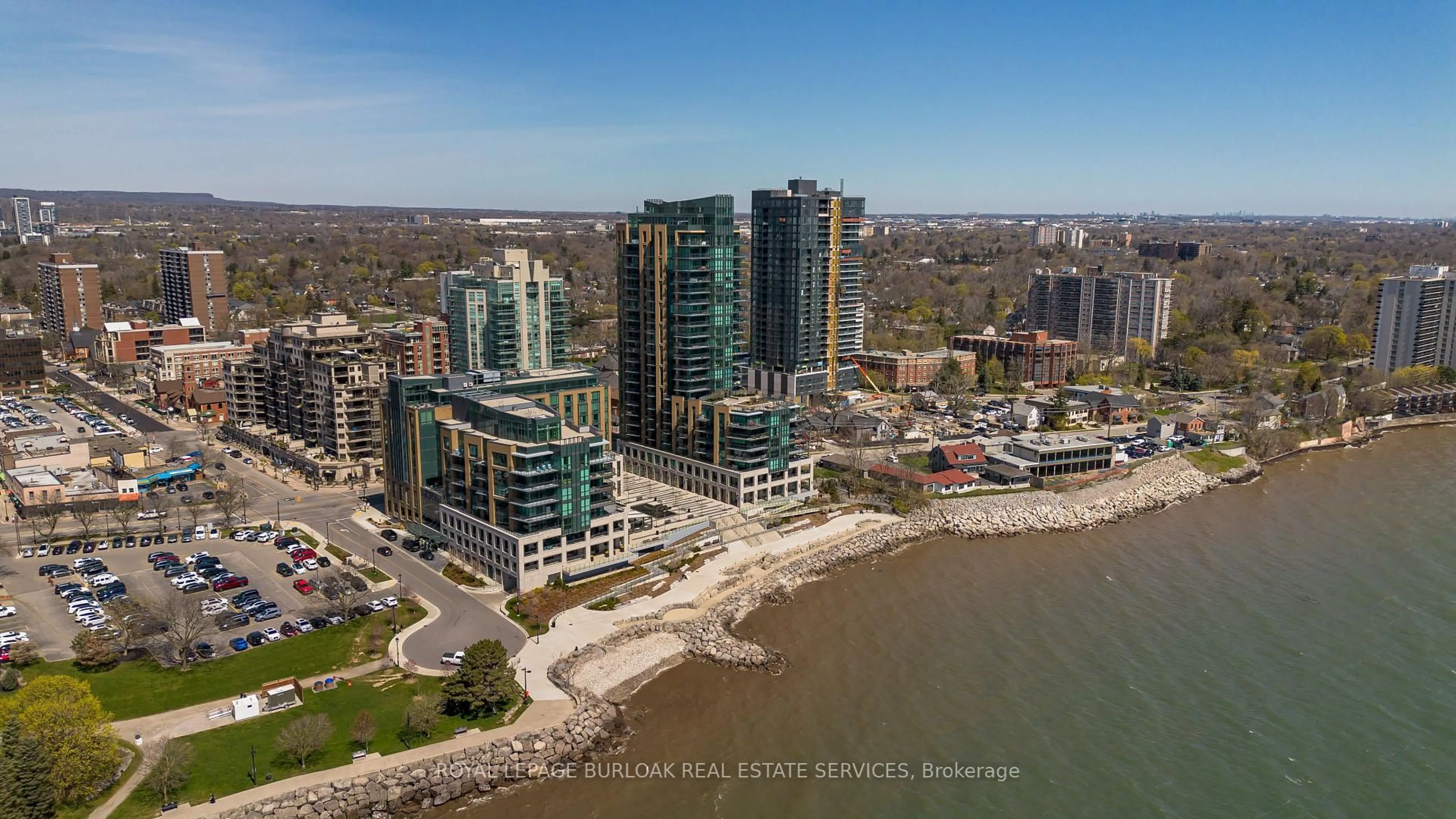 A pic from outside/outdoor area/front of a property/back of a property/a pic from drone, water/lake/river/ocean view for 2060 Lakeshore Rd #1303, Burlington Ontario L7R 0G2