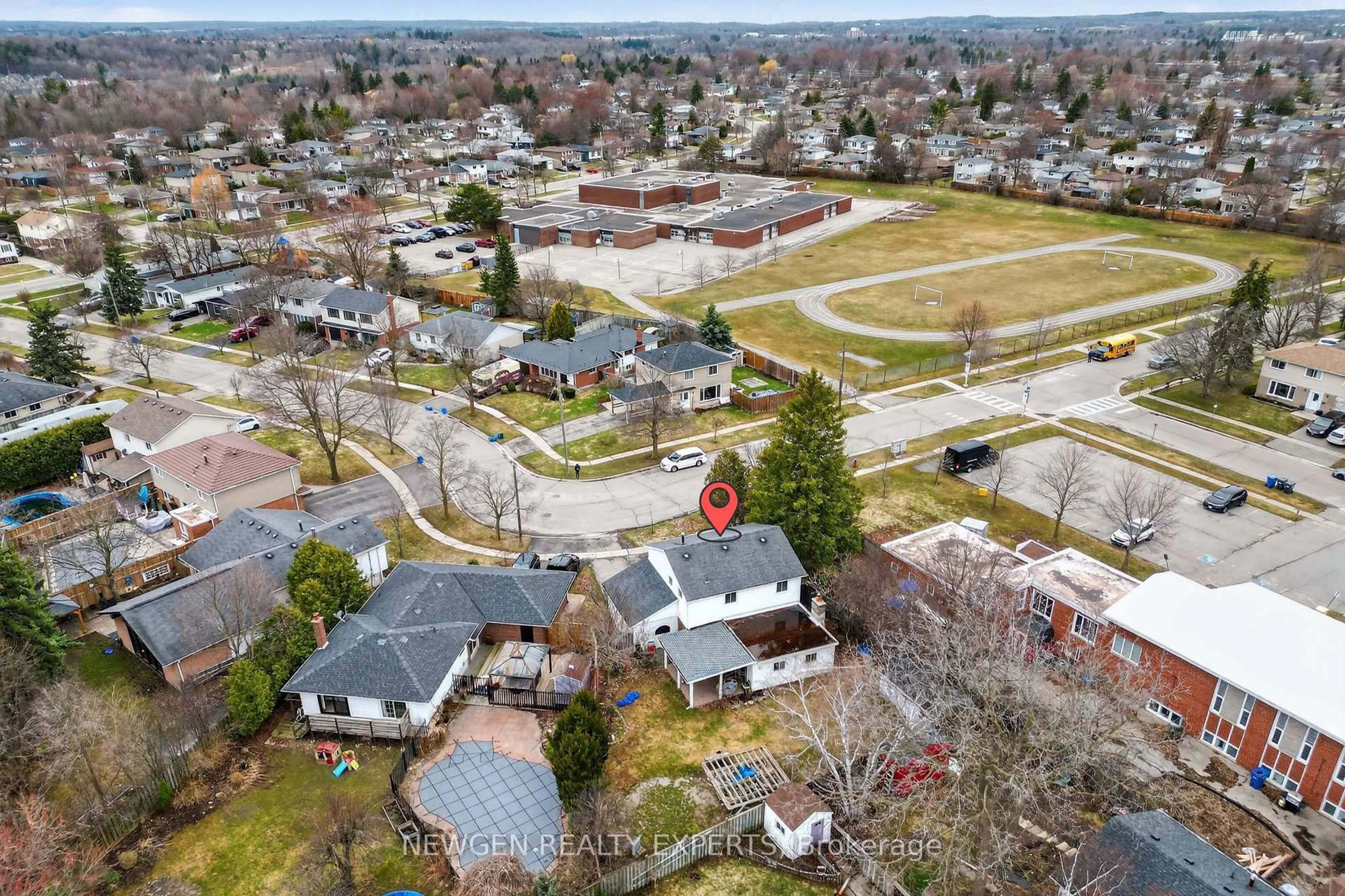 A pic from outside/outdoor area/front of a property/back of a property/a pic from drone, street for 63 FALUDON Dr, Halton Hills Ontario L7G 1H9