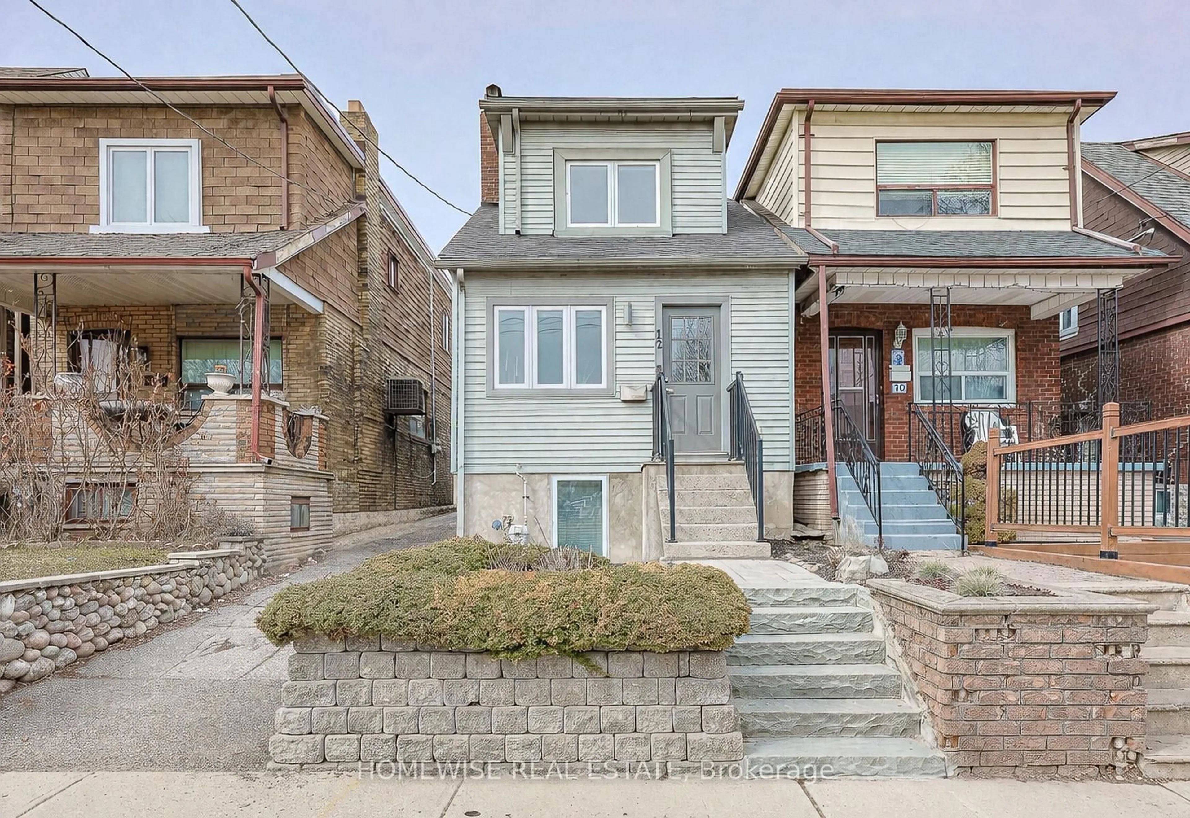 Home with brick exterior material, street for 12 Leeds St, Toronto Ontario M6G 1N7