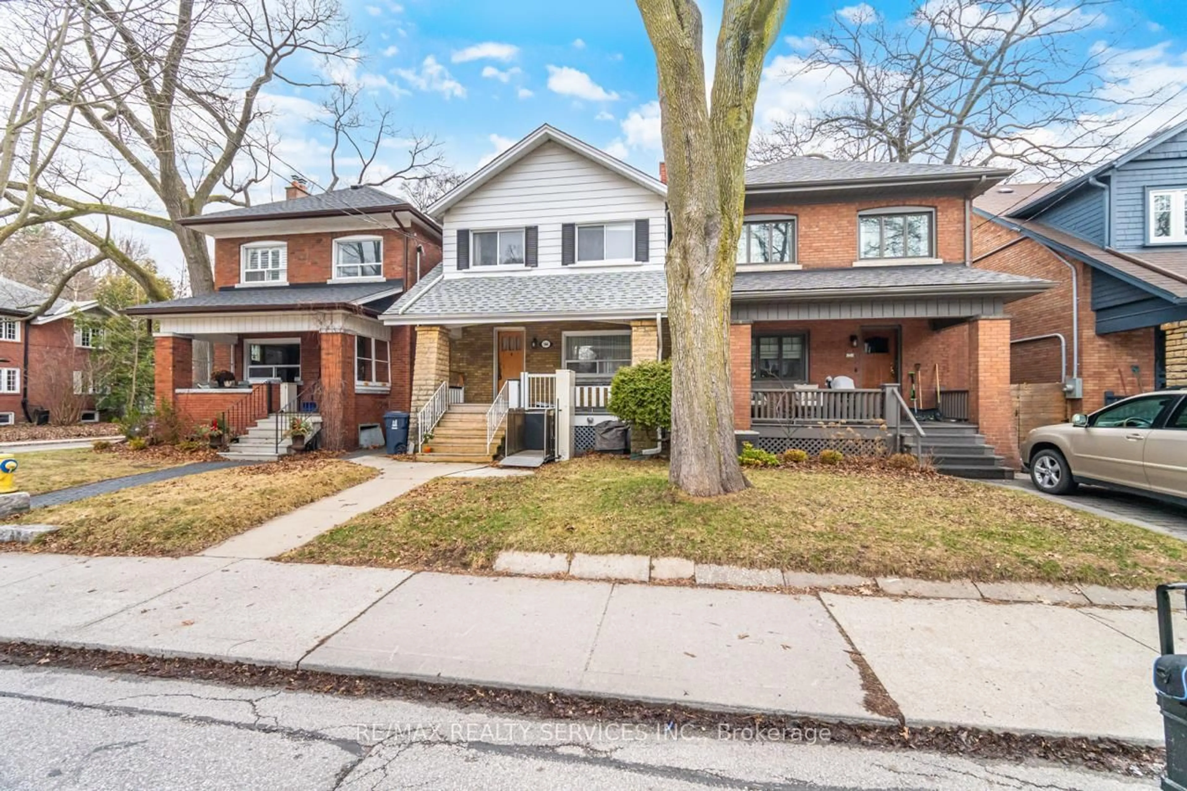 Home with brick exterior material, street for 544 Windermere Ave, Toronto Ontario M6S 3L7