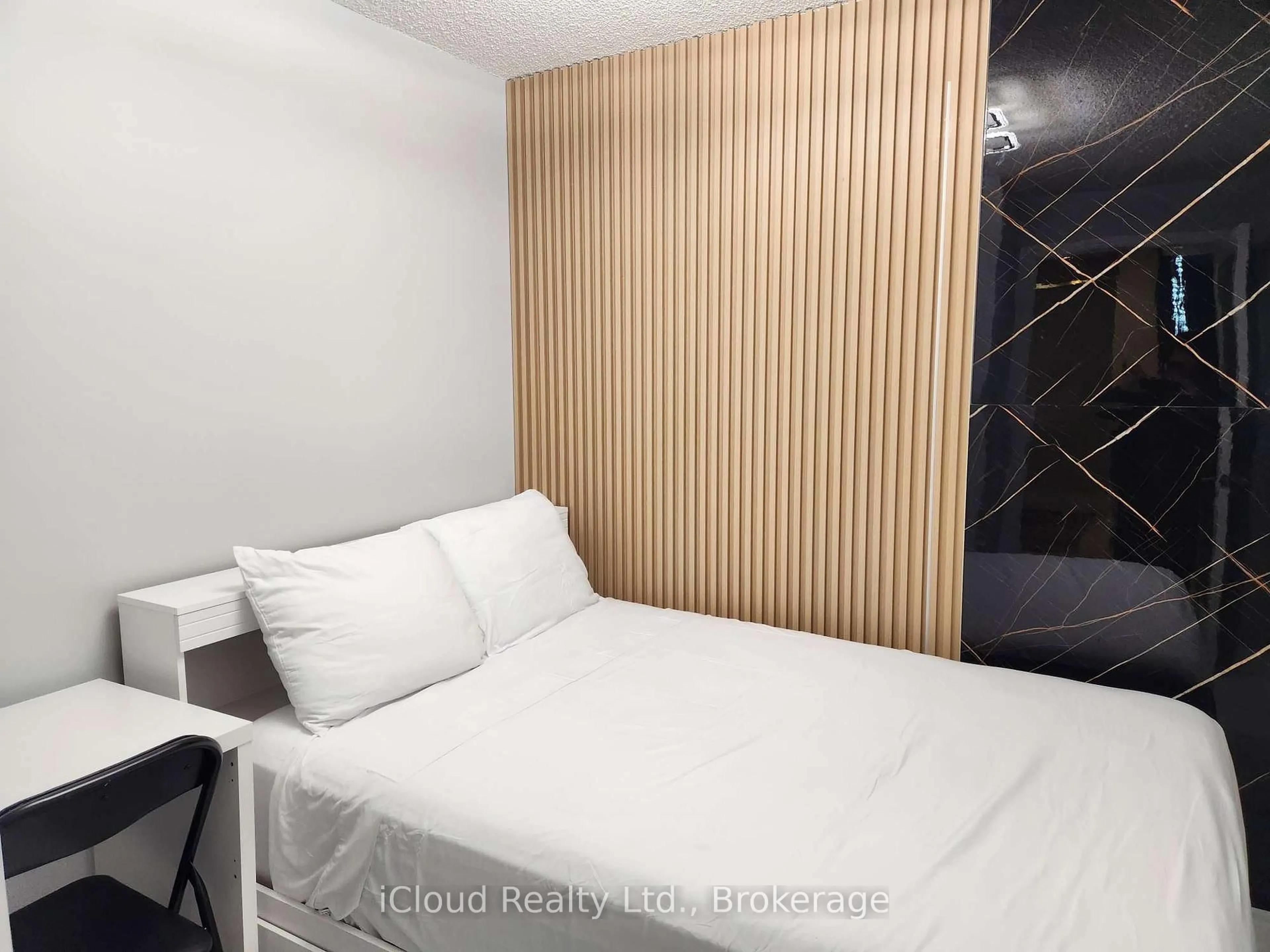 Bedroom with bed, wood/laminate floor for 310 Burnhamthorpe Rd #3114, Mississauga Ontario L5B 4P9