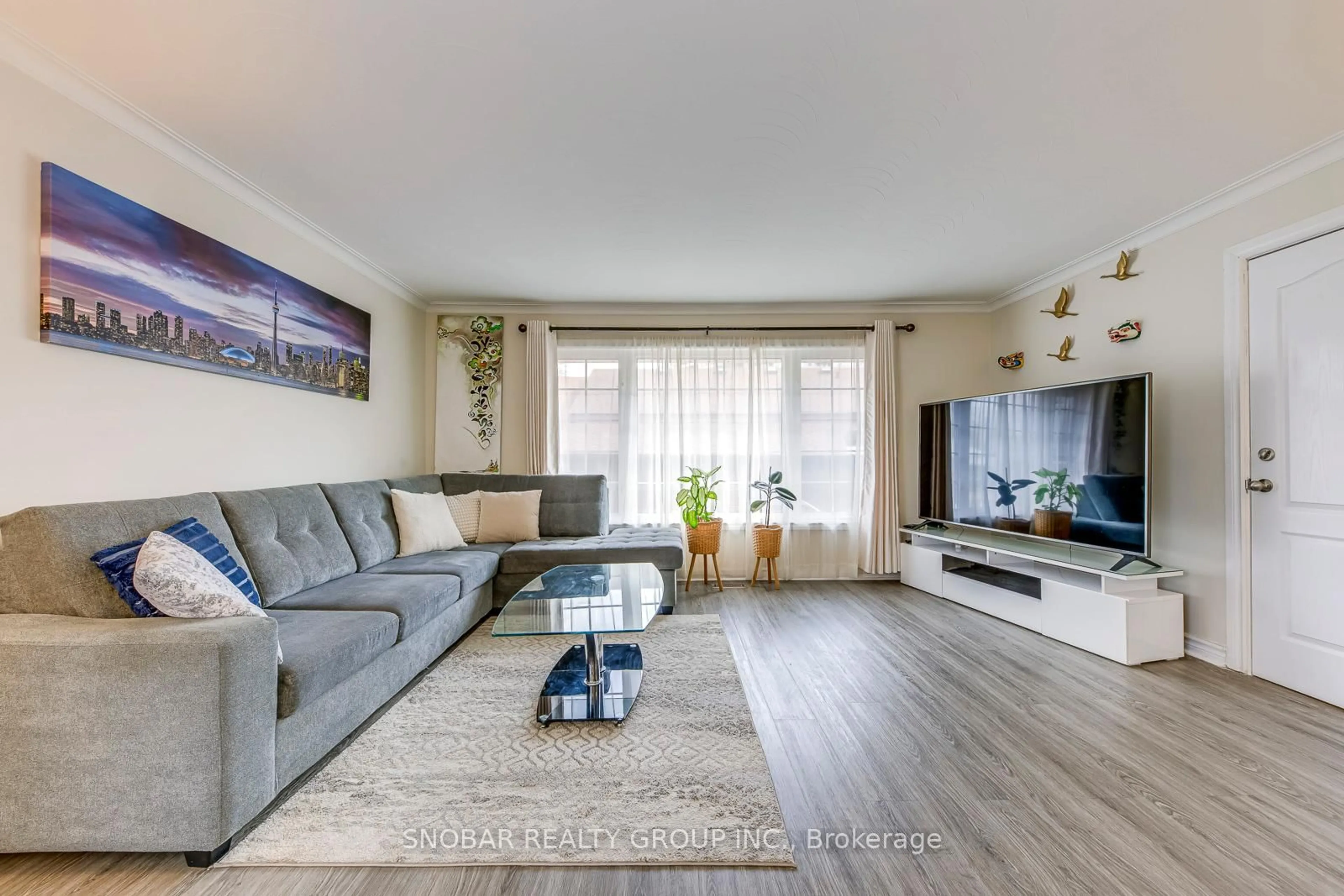 Living room with furniture, unknown for 97 Westhampton Dr, Toronto Ontario M9R 1Y1