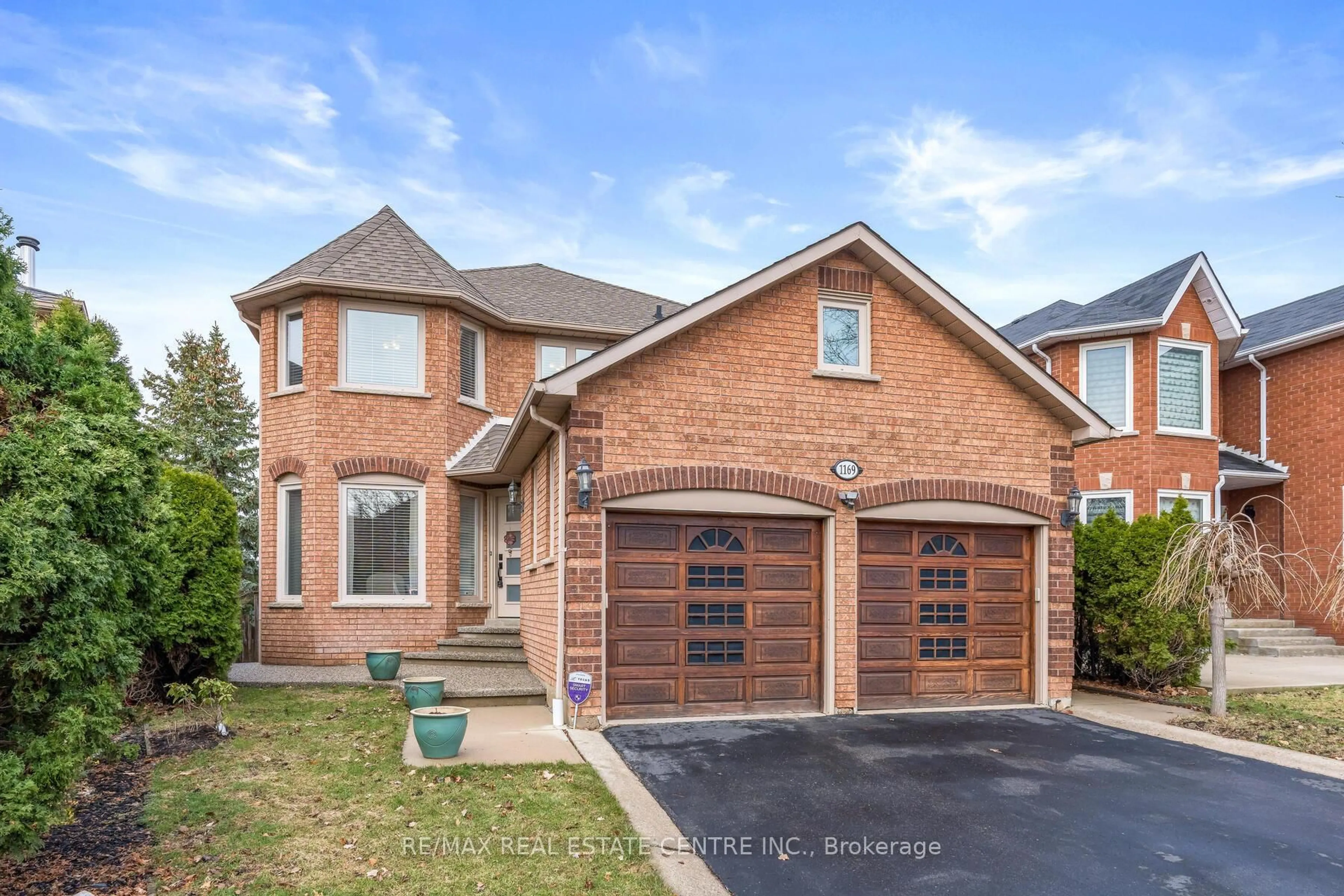 Home with brick exterior material, street for 1169 Ewing Cres, Mississauga Ontario L5V 1C1